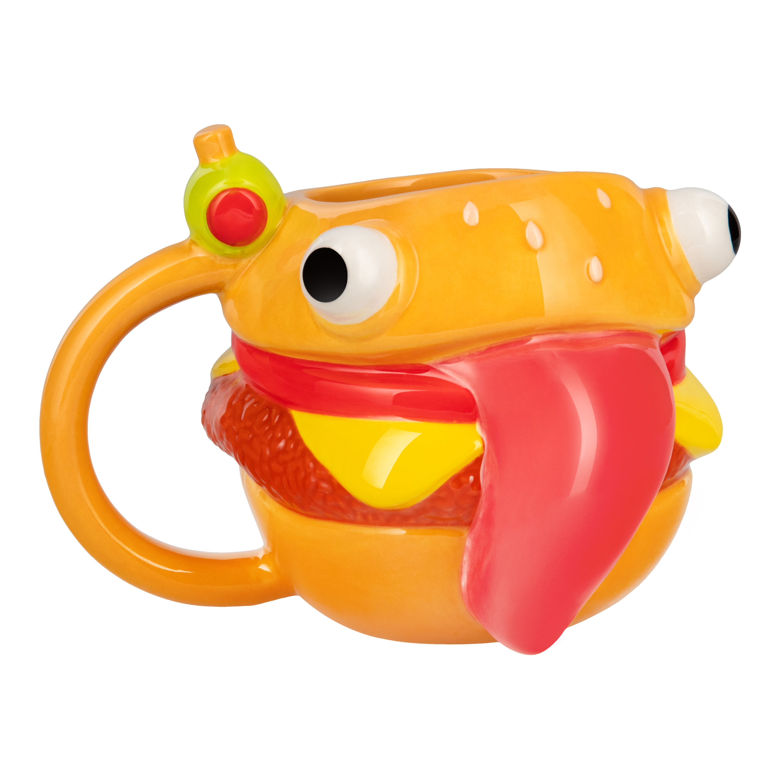 Eine keramik-burgerförmige Tasse mit Kulleraugen und einer langen Zunge. Sie ist gelb, rot und orange.