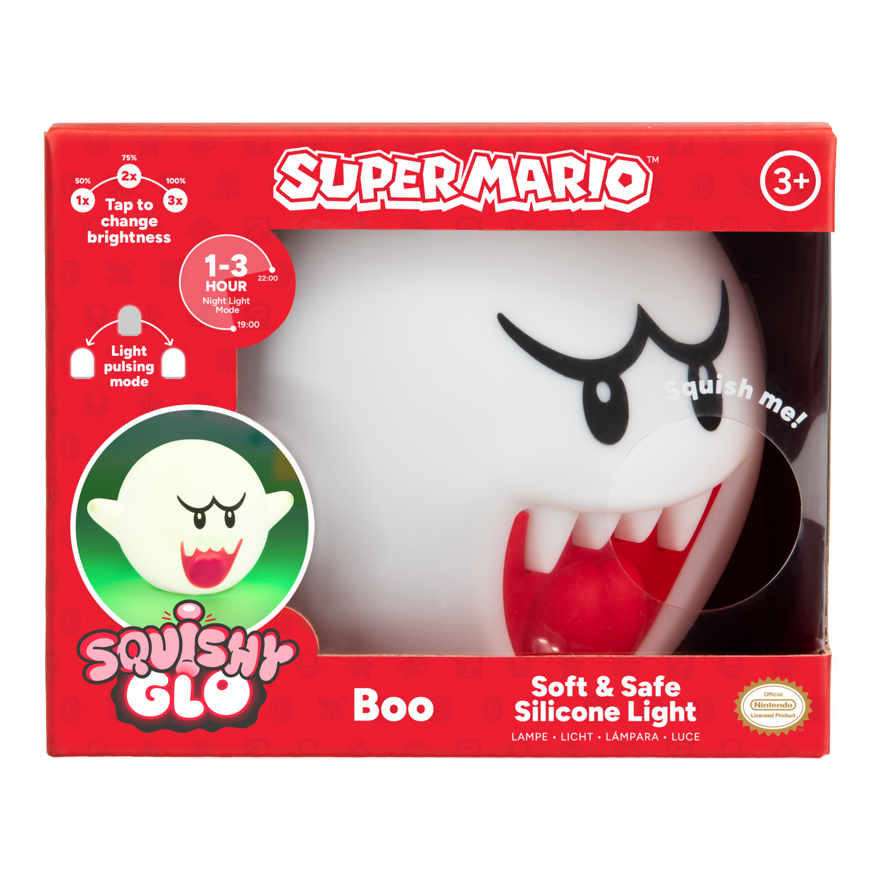 Ein Super Mario Boo Nachtlicht in einer Box. Es ist weiß mit schwarzen Augen und Mund und roten Details. Die Box ist rot.