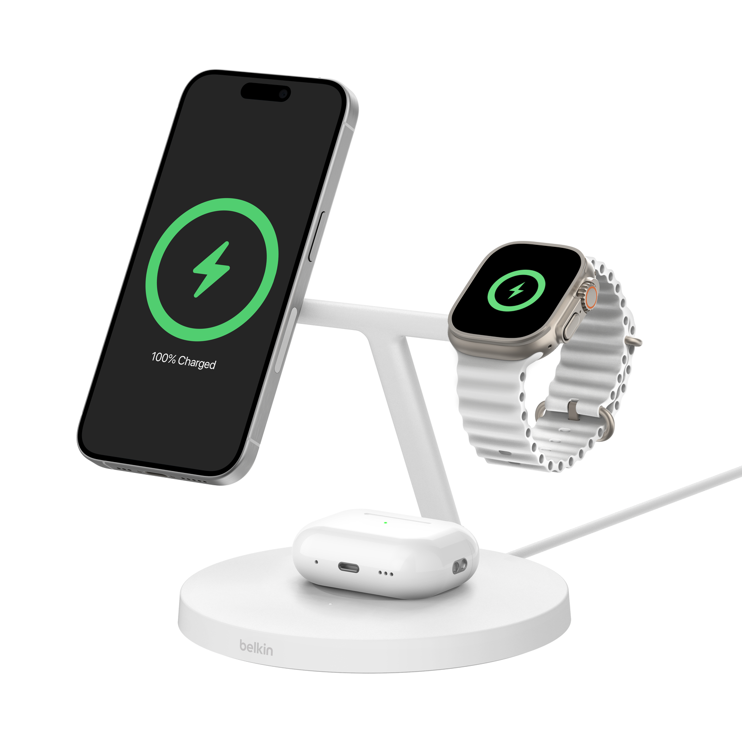Une station de charge blanche avec un téléphone, une montre et des écouteurs. Tous les appareils affichent des symboles de charge. Le téléphone indique 100% chargé.