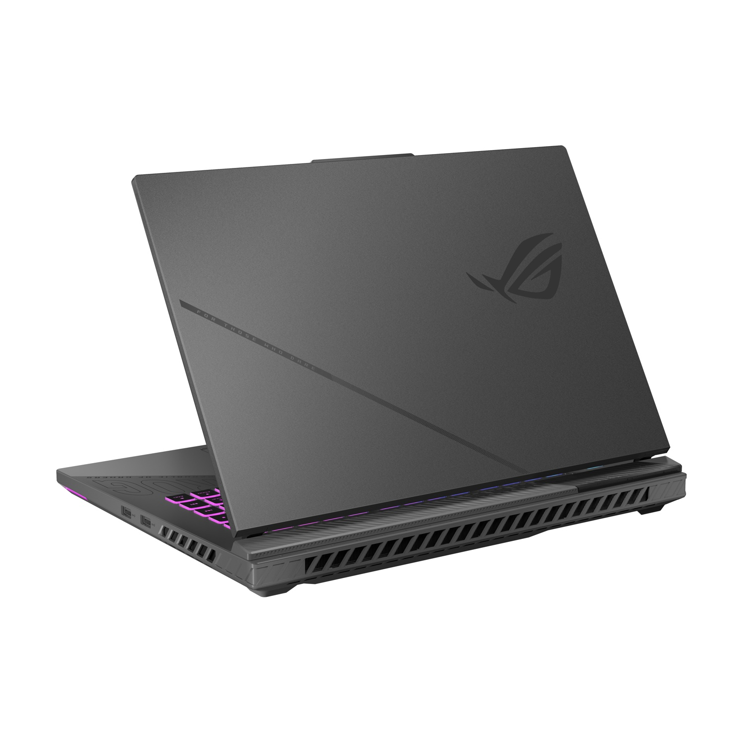 Un laptop grigio leggermente aperto, mostra la tastiera con illuminazione viola. Il logo ROG è visibile.