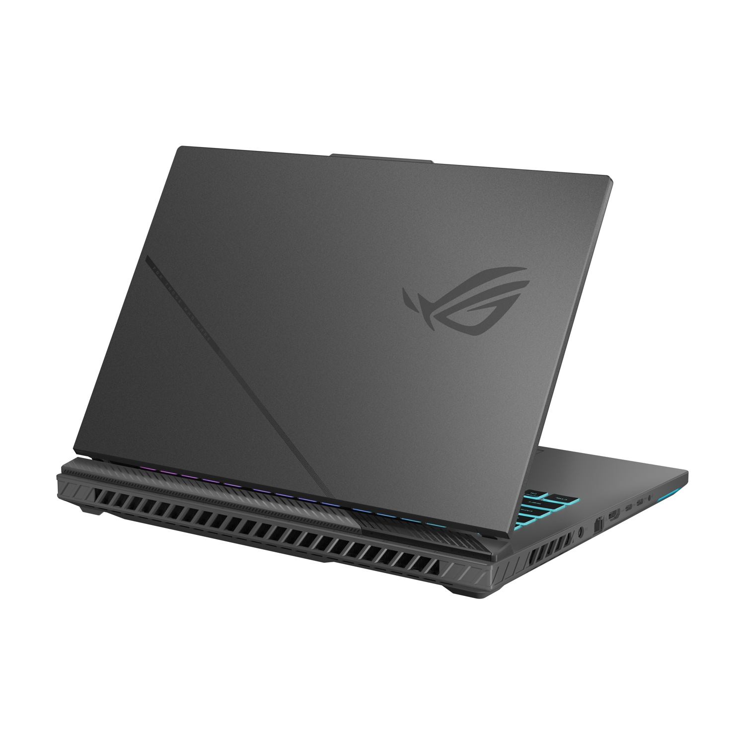Un laptop grigio scuro, logo ROG visibile. Il laptop è leggermente aperto, mostrando la tastiera e le ventole con luci colorate.