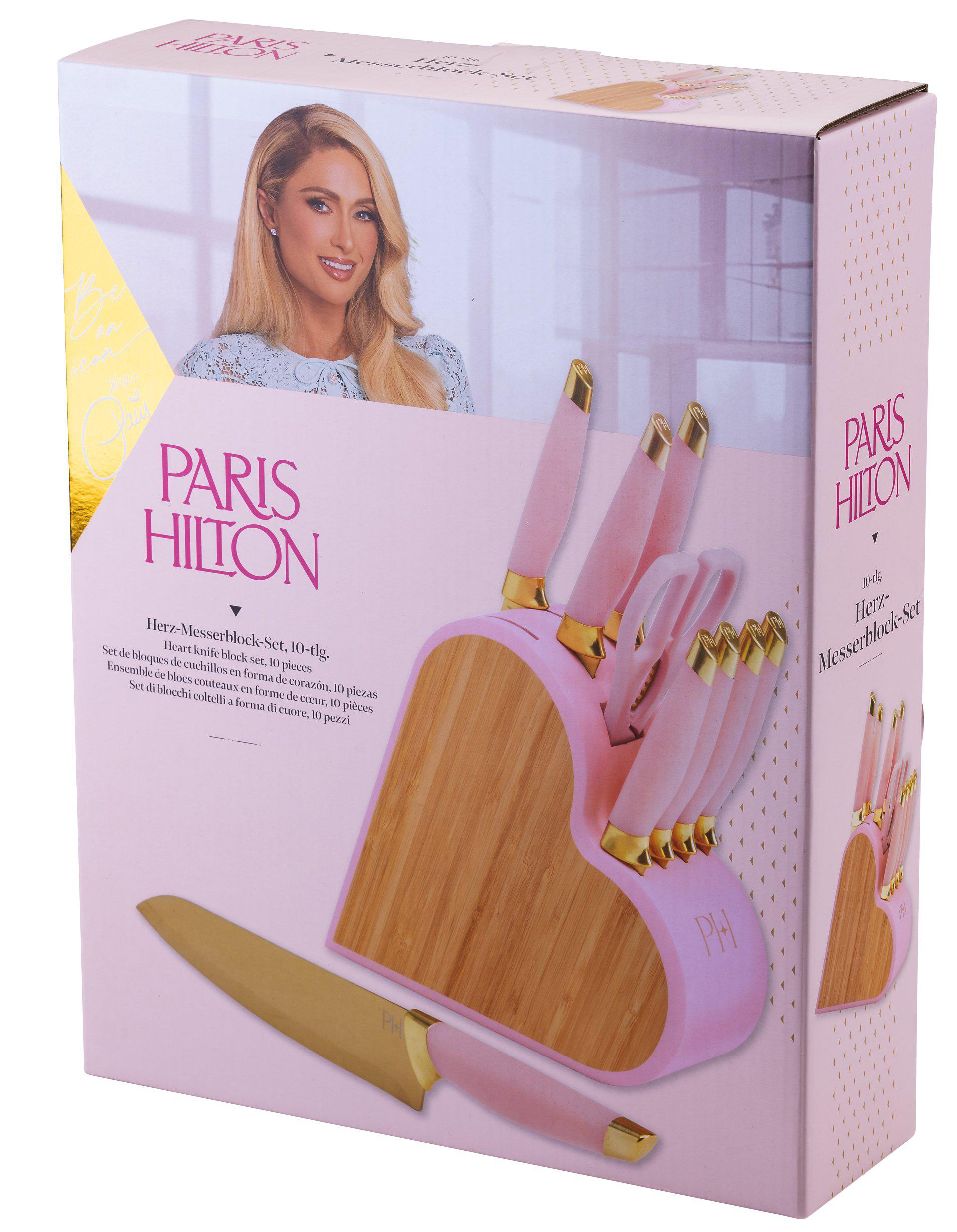 Ein rosa Paris Hilton Messerset in einem herzförmigen Block. Die Schachtel zeigt Paris Hilton und Produktdetails.