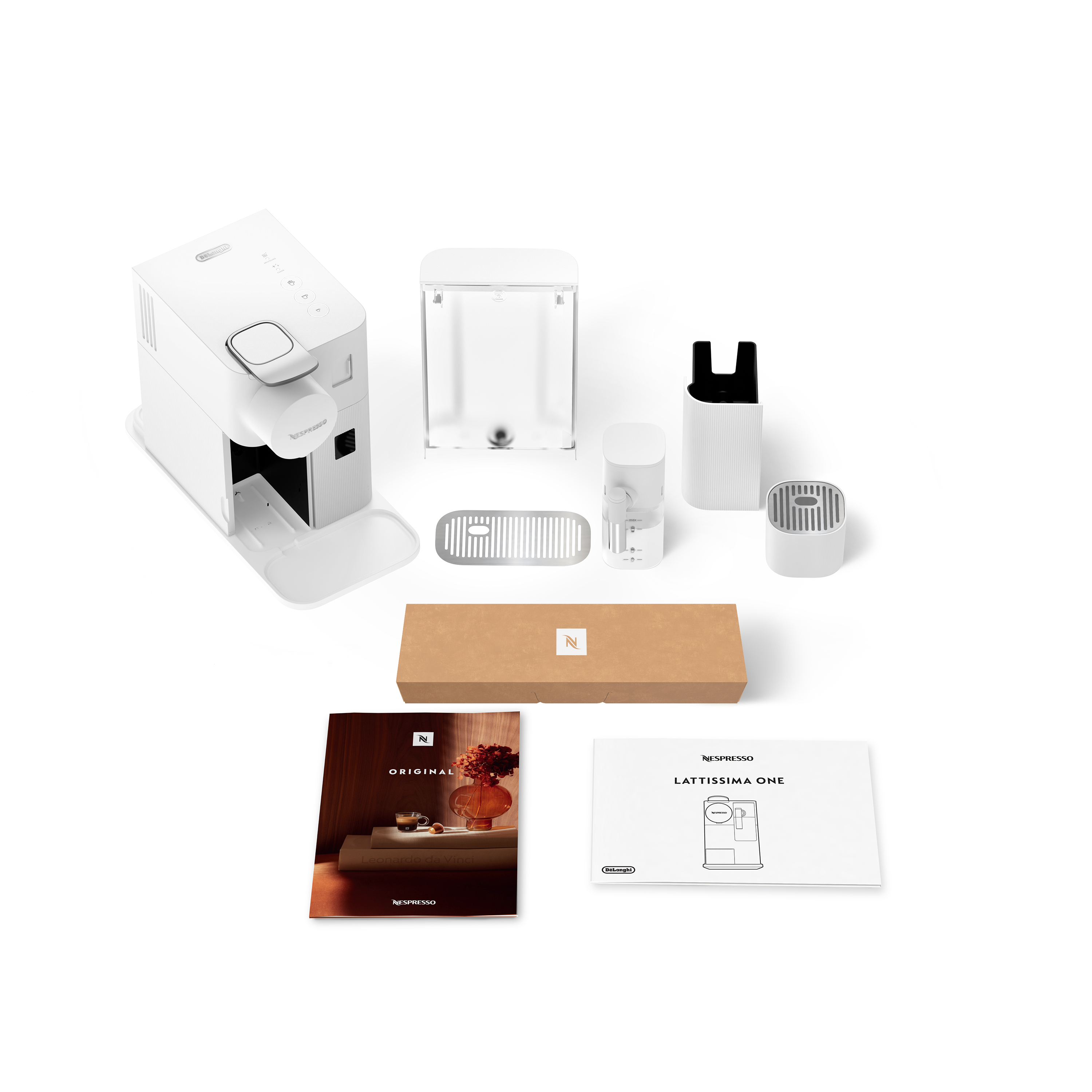 Eine weiße Nespresso Lattissima One Kaffeemaschine mit Zubehör und Dokumenten auf weißem Untergrund.