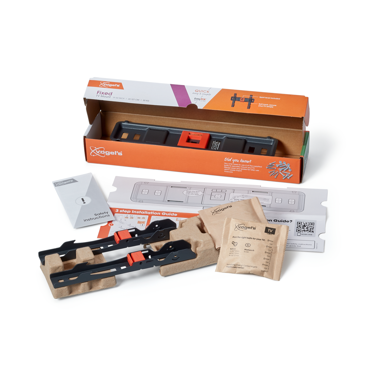 A TV mount kit with a box, instructions, and mounting brackets. It includes screws and a spirit level.