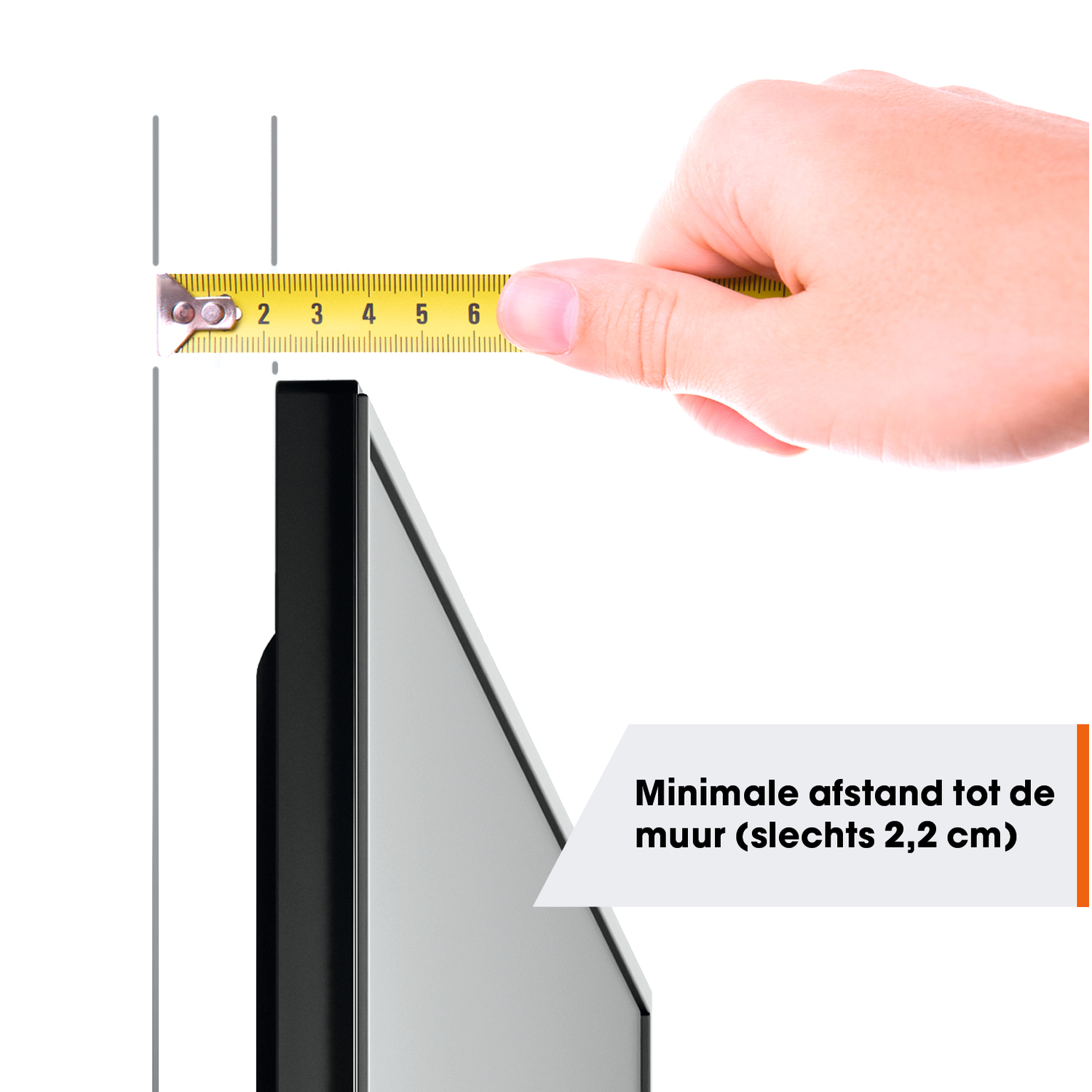 A hand holds a yellow tape measure near a gray and black object. The tape measure shows 2 cm. Text says: Minimal distance to the wall.