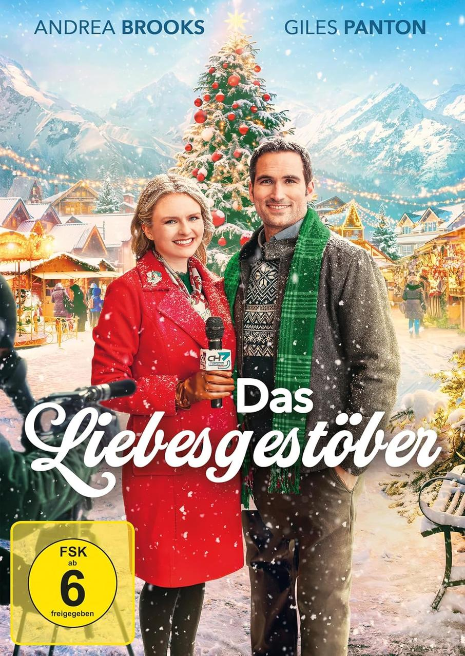 Filmposter mit zwei Personen vor einem Weihnachtsbaum. Frau in Rot, Mann mit grünem Schal. Titel: Das Liebesgestöber.