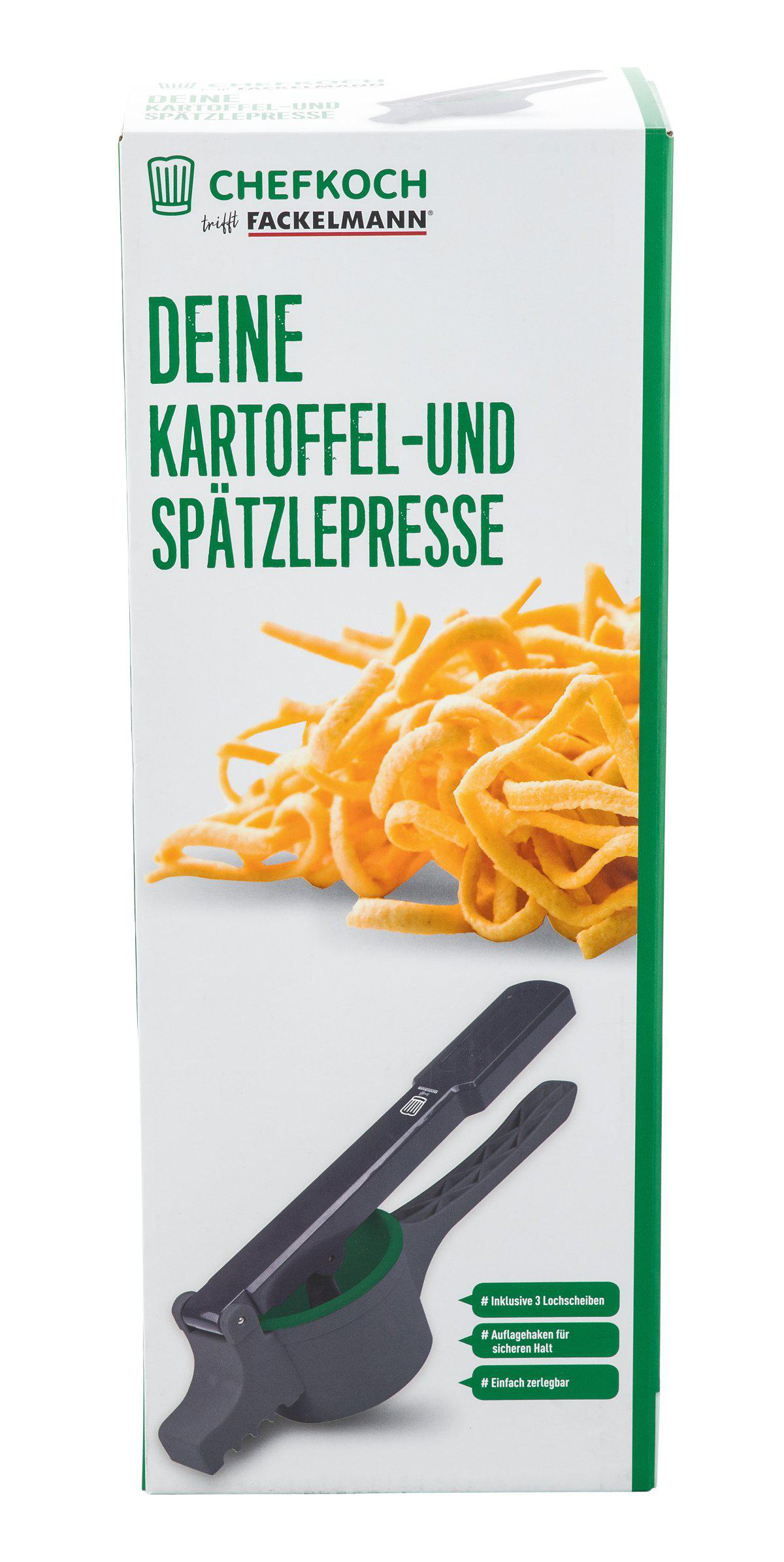 Schachtel mit grünen Akzenten, mit einer Kartoffel- und Spätzlepresse. Text auf Deutsch. Nudeln und Presse sind sichtbar.