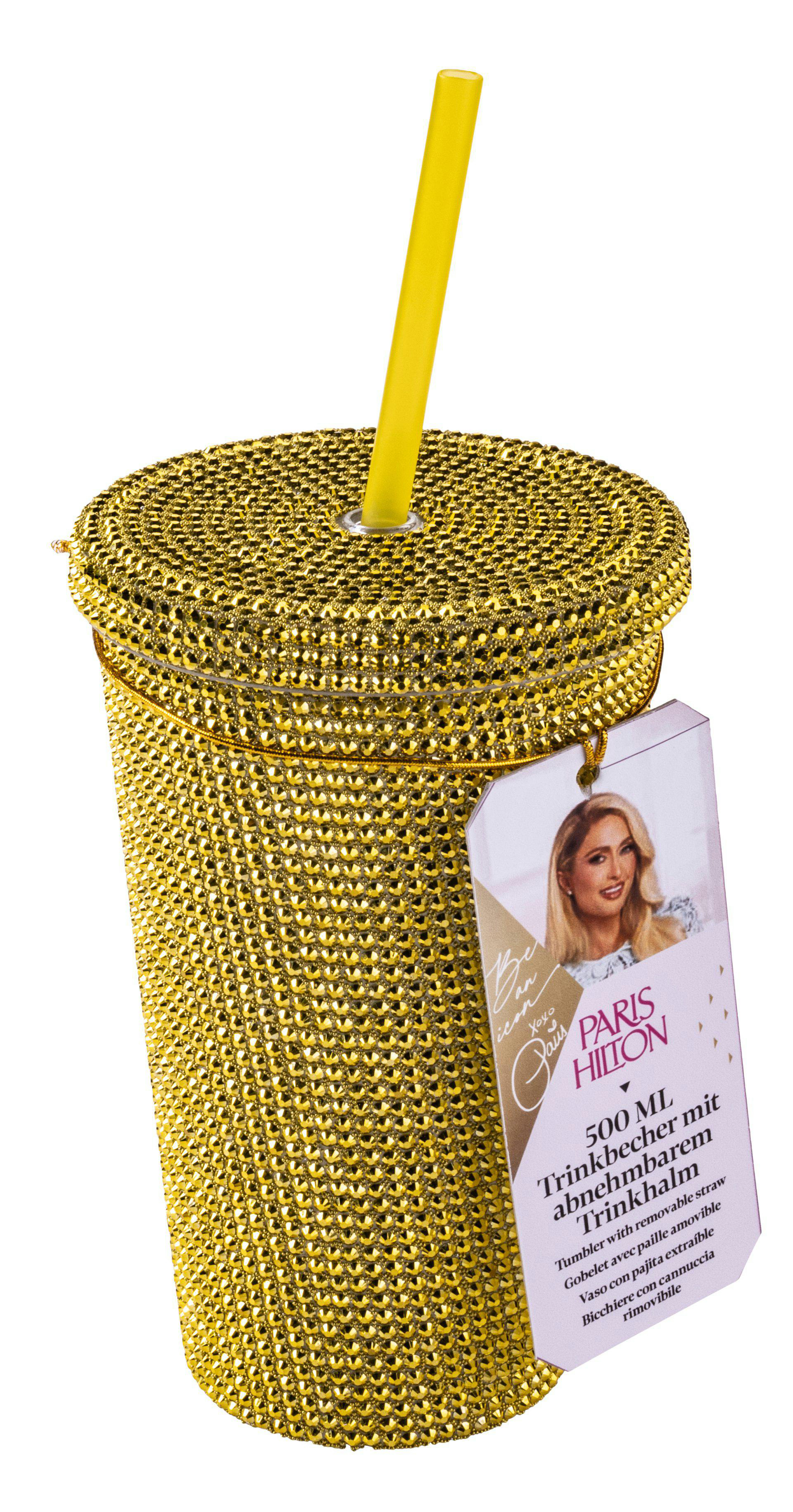 Goldbesetzter Becher mit gelbem Strohhalm, Deckel und Etikett mit Paris Hiltons Bild und Produktdetails.