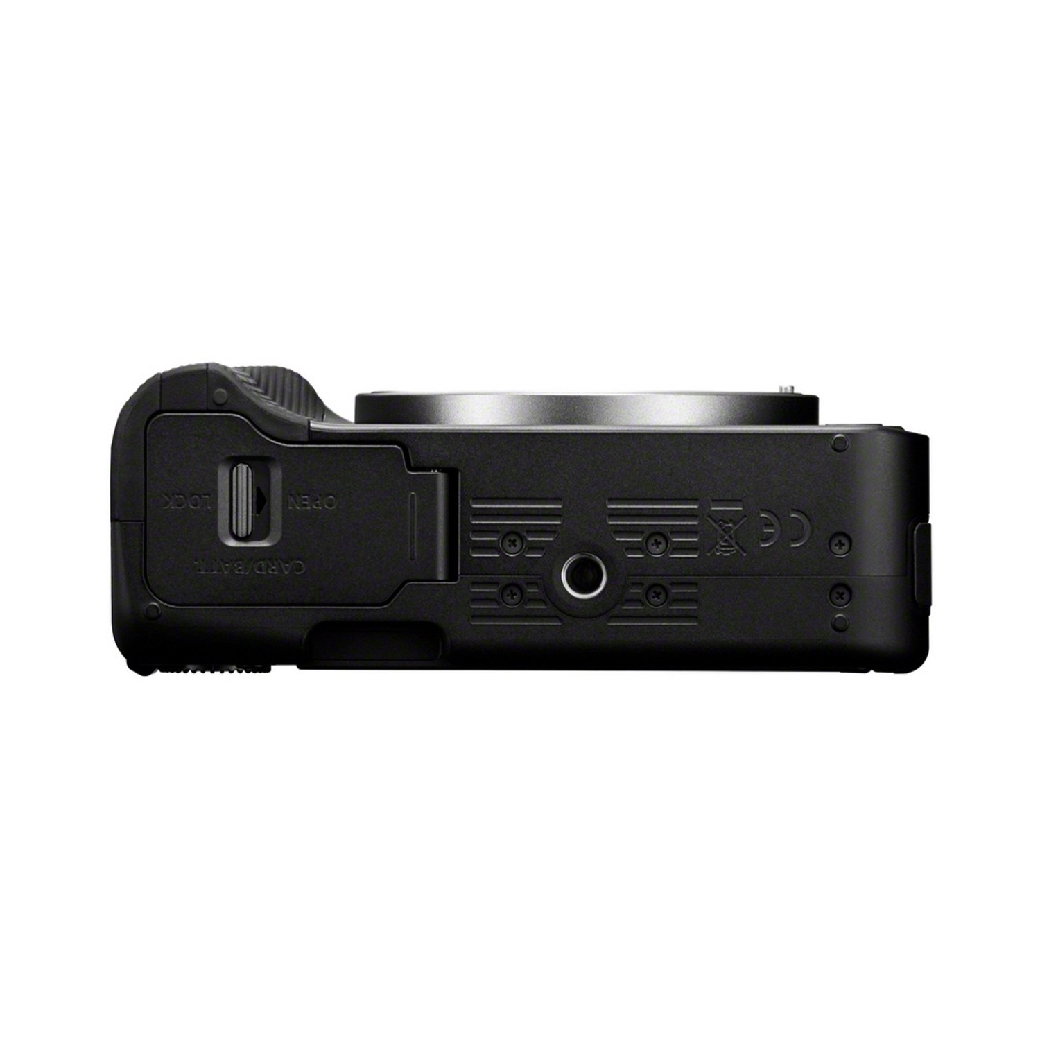 A black camera body, seen from the side, with a card/battery slot, buttons, and a lens mount. Details include text and symbols.