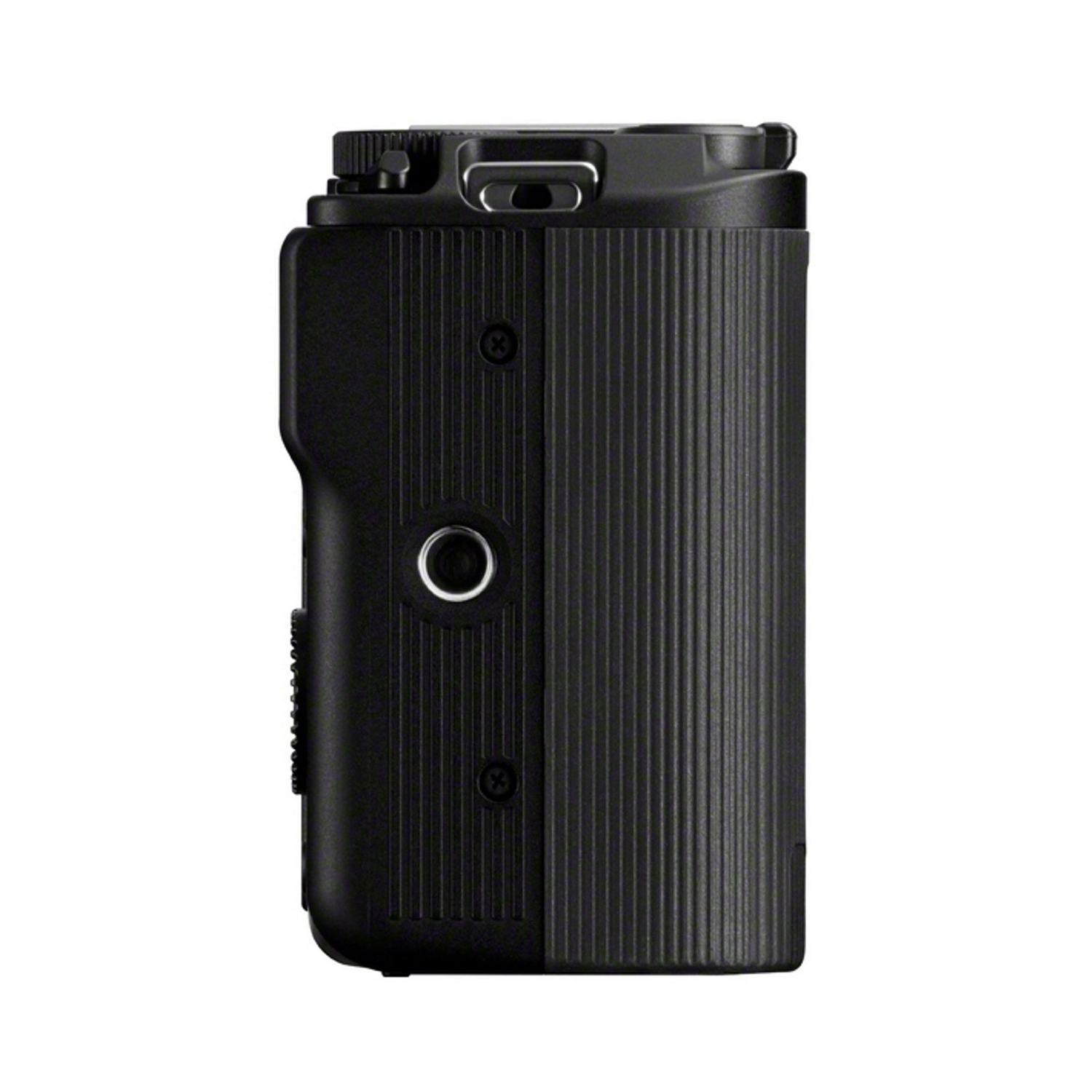 A black camera body, with ribbed texture on the right side and a circular button on the left side.