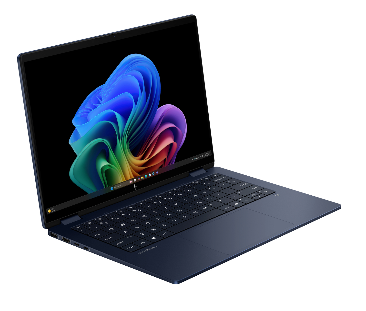Una laptop azul marino está abierta, mostrando una imagen abstracta colorida. El teclado es visible y la laptop está sobre una superficie blanca.