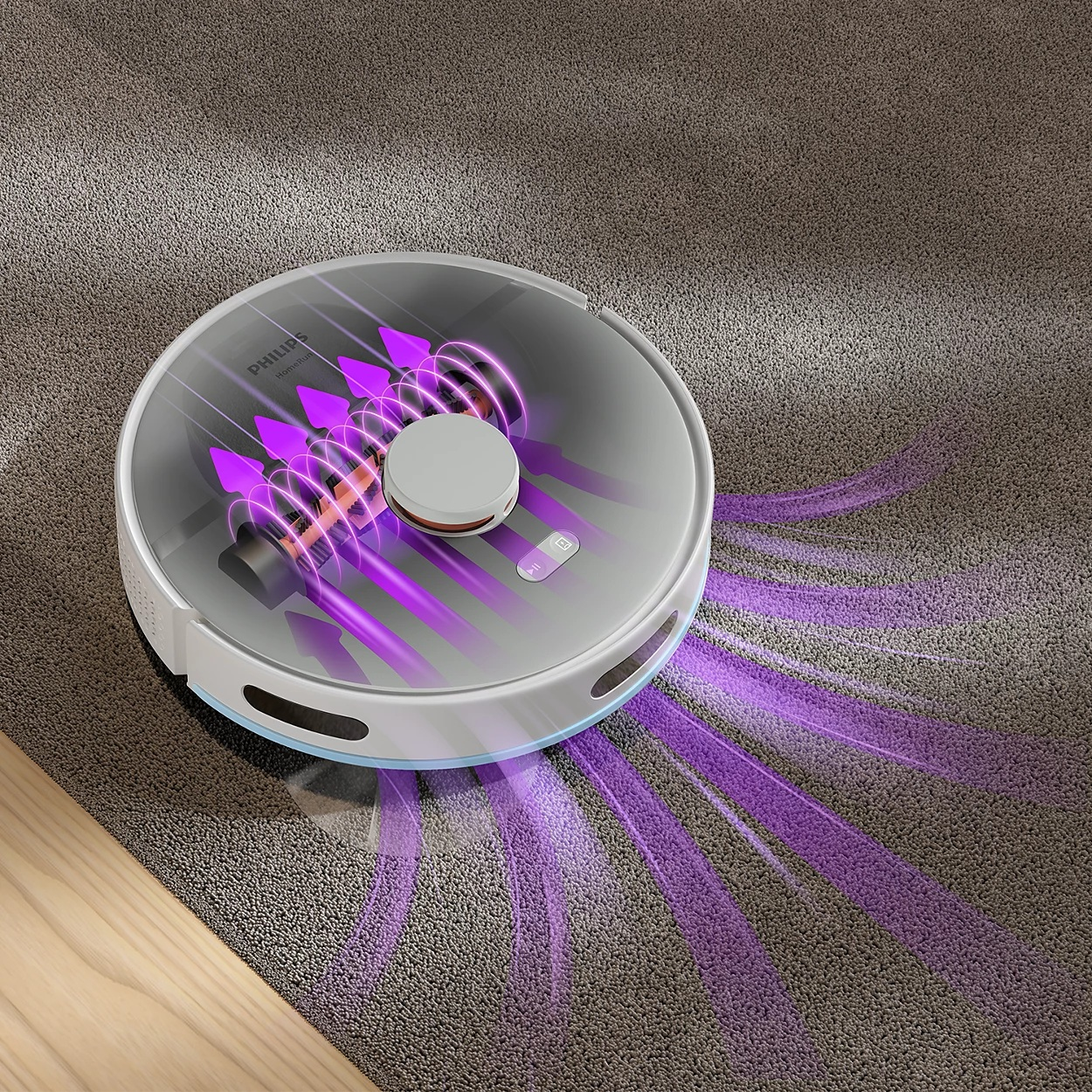 Biało-szary robot sprzątający na dywanie. Fioletowe strzałki wskazują ścieżki ssania. Odkurzacz ma okrągły kształt.