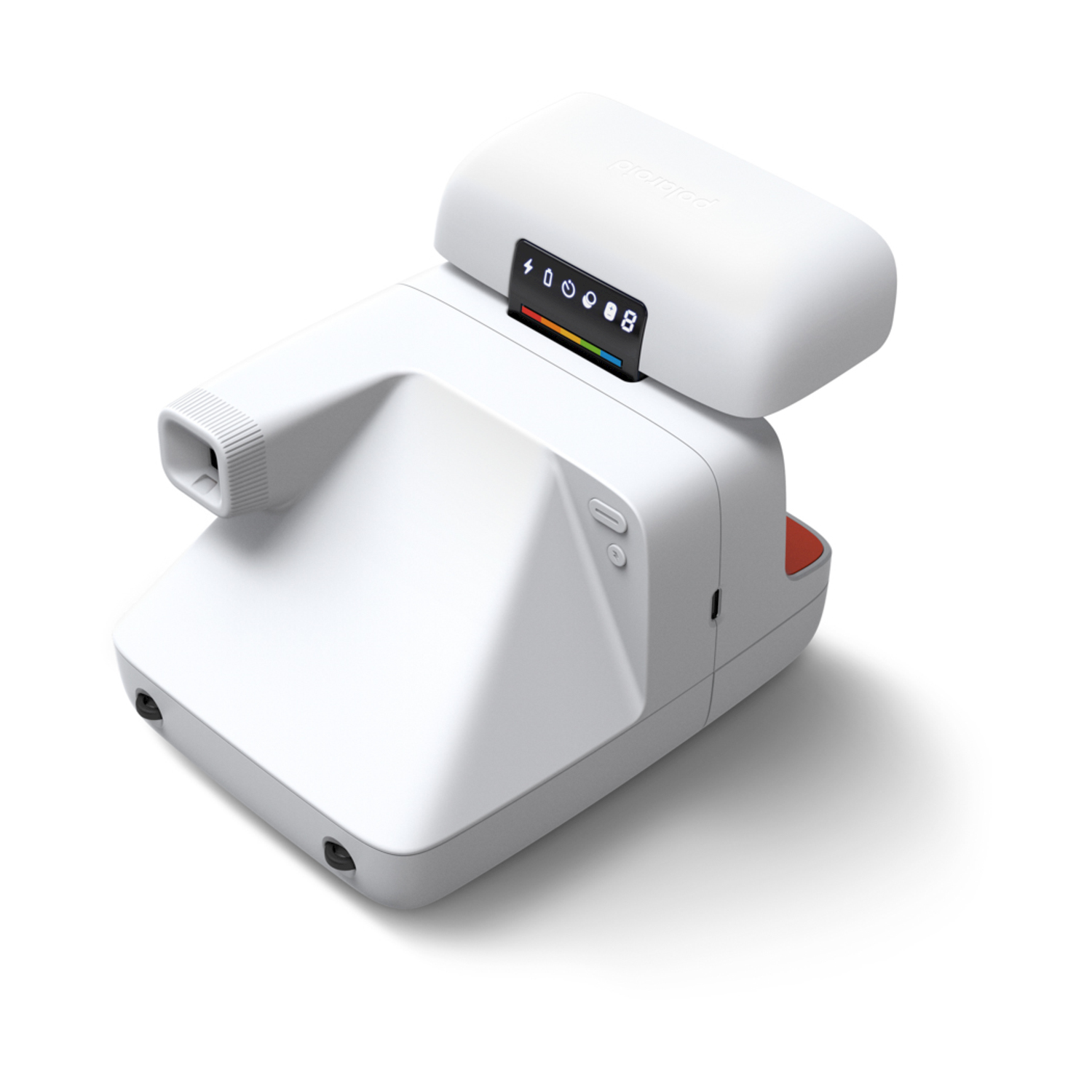 Una fotocamera Polaroid bianca è su una superficie bianca. Ha un mirino rettangolare, un obiettivo e un piccolo display.