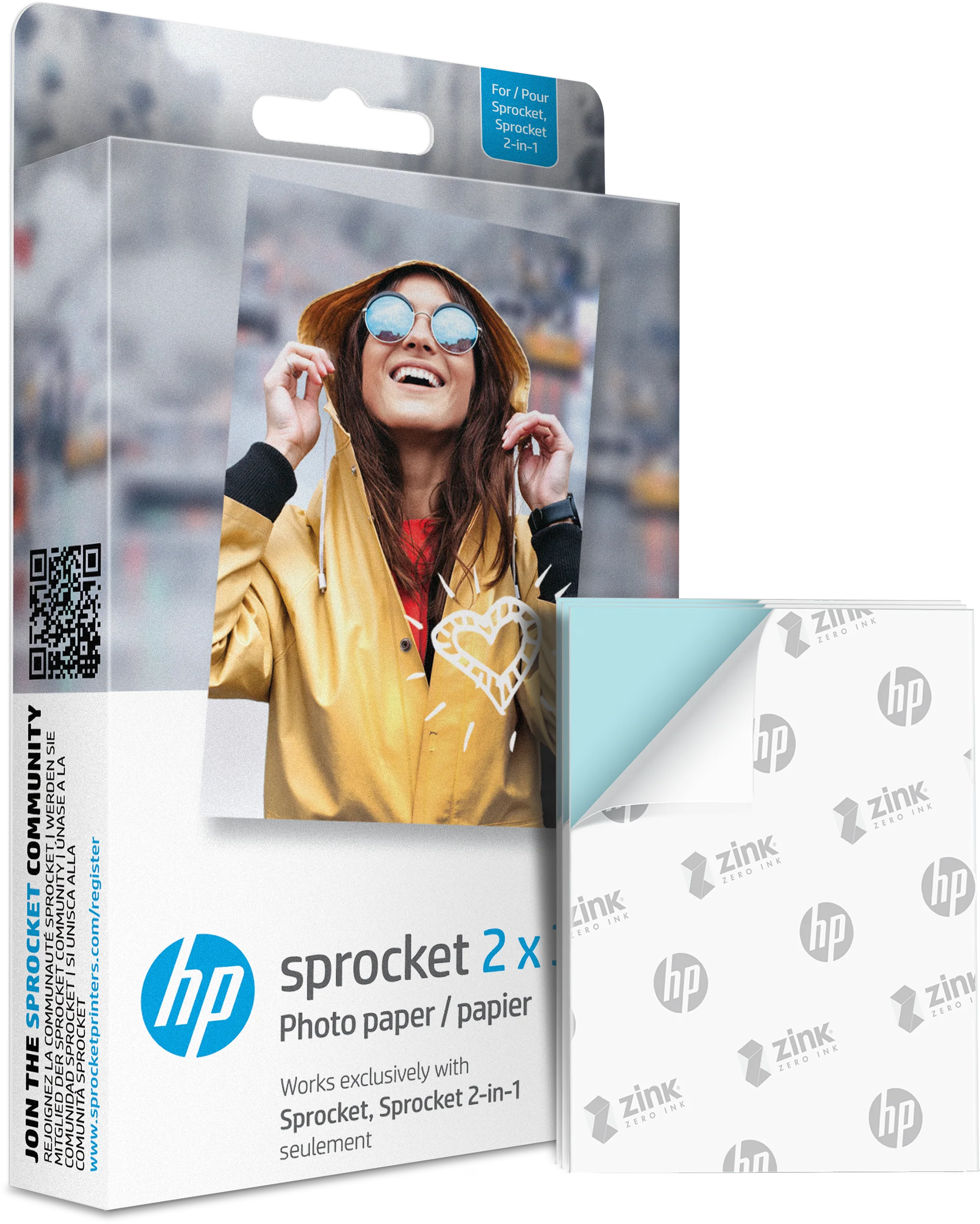 HP Sprocket fotópapír csomag, sárga kabátos nővel a dobozon. Fotópapír oldalt.