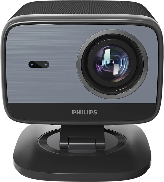 Une webcam Philips sur un support. Elle a un objectif, un microphone et le nom de la marque. L'appareil est noir et gris.