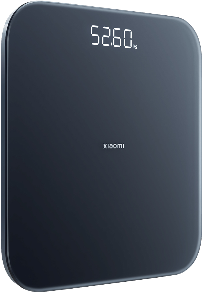 Egy fekete Xiaomi digitális mérleg 52,60 kg-ot mutat. A mérleg lekerekített sarkokkal és minimalista dizájnnal rendelkezik. A Xiaomi logó látható.