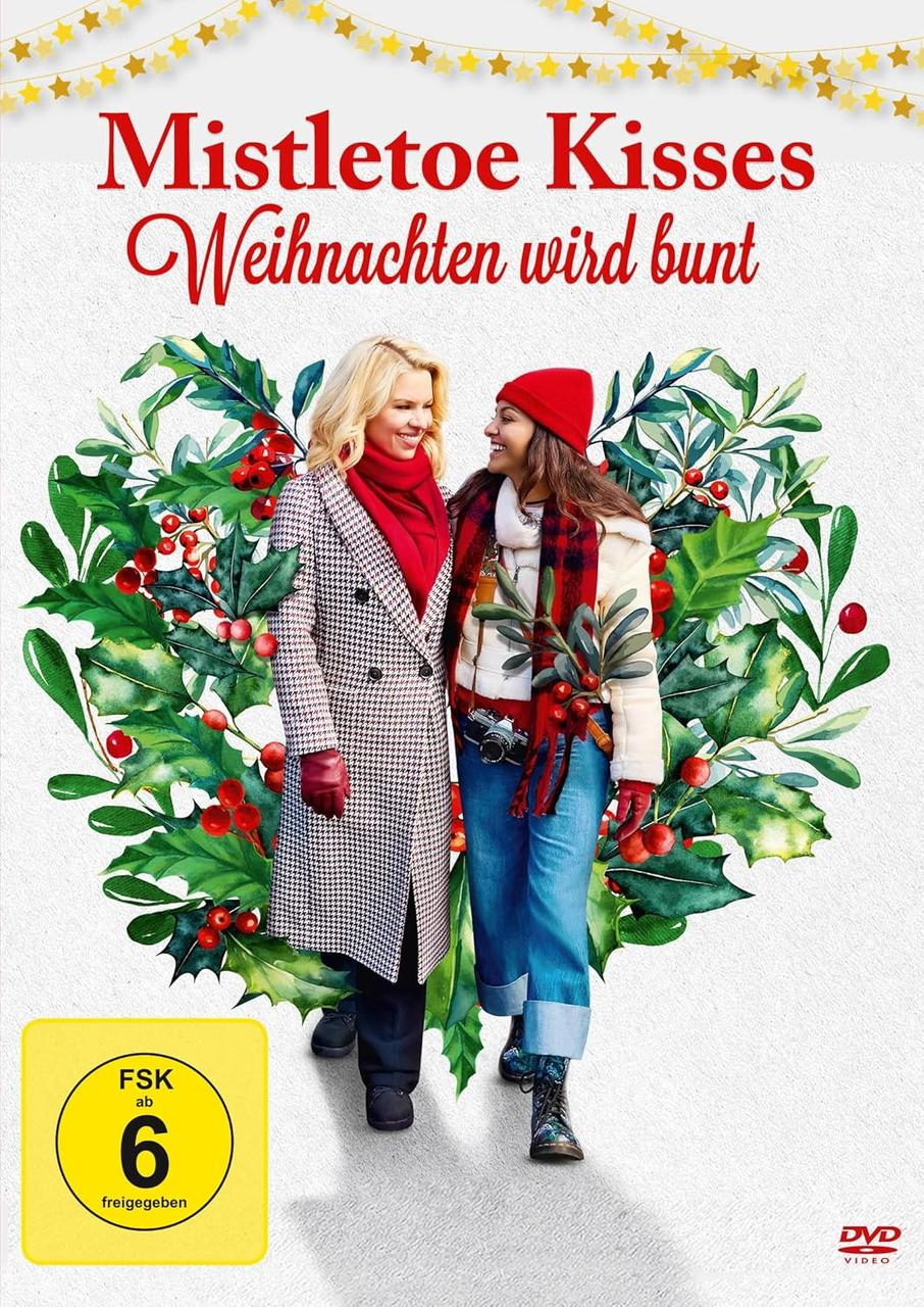 Zwei lächelnde Frauen vor weihnachtlichem Hintergrund. Der Titel 'Mistletoe Kisses' steht darüber.