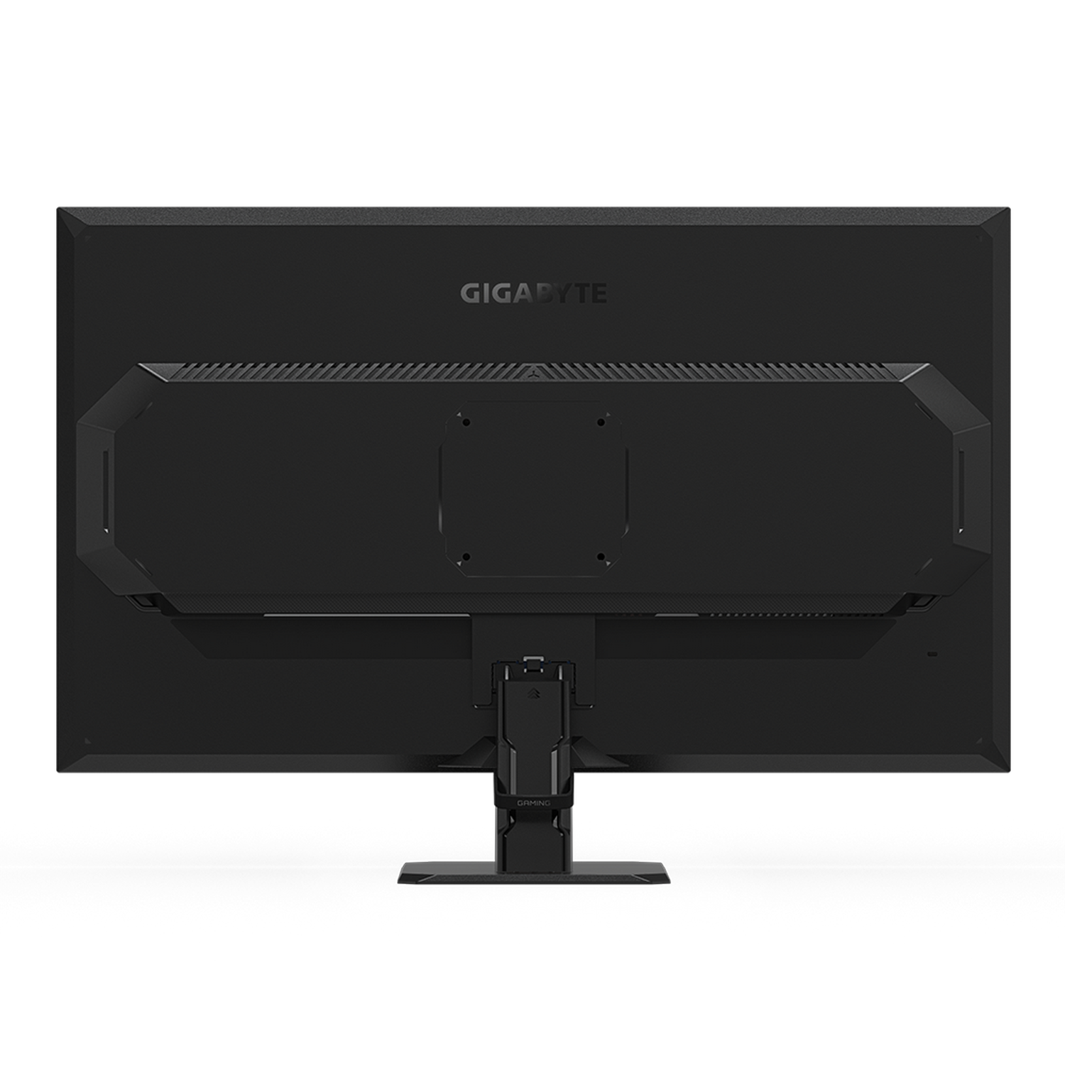 Vista trasera de un monitor gaming Gigabyte negro. Muestra puertos, soporte y nombre de la marca. El fondo es gris degradado.