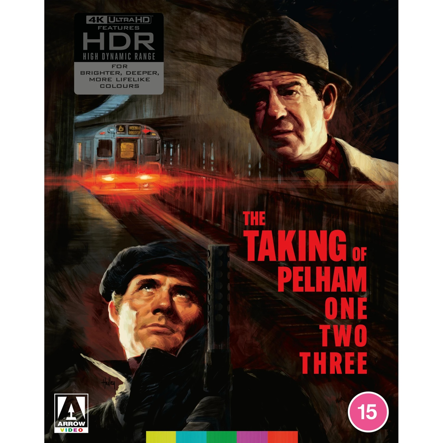Movie poster for "The Taking of Pelham One Two Three". Features men in hats, a subway train, and the film title in red.