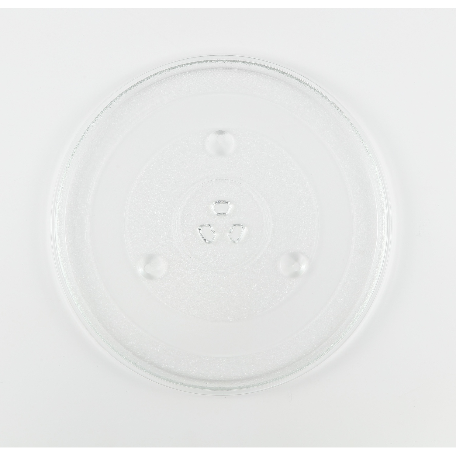 A clear glass microwave plate on a white background. It has a circular design with three raised dimples and a center hub.