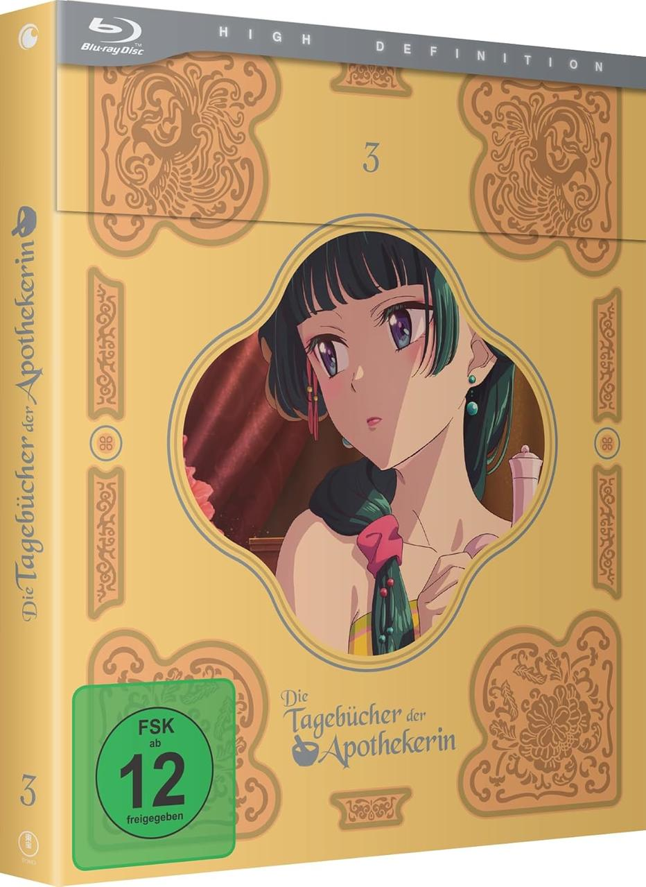 Blu-ray-Box-Art. Anime-Frau in Gold gerahmt. Box hat Text auf Deutsch. Die Box hat eine grüne FSK 12-Bewertung.