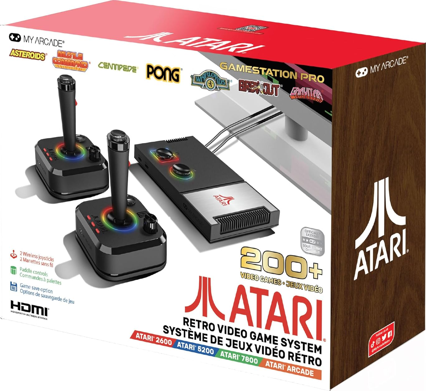 Boîte Atari Gamestation Pro. Comprend une console, deux joysticks avec lumières colorées et des jeux comme Asteroids et Pong.