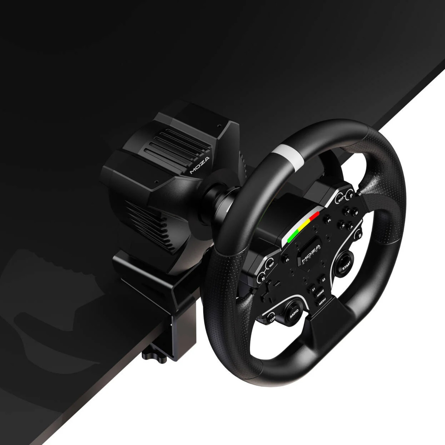 A black MOZA racing wheel is mounted on a black table. The wheel has buttons and a white stripe at the top. The background is white.
