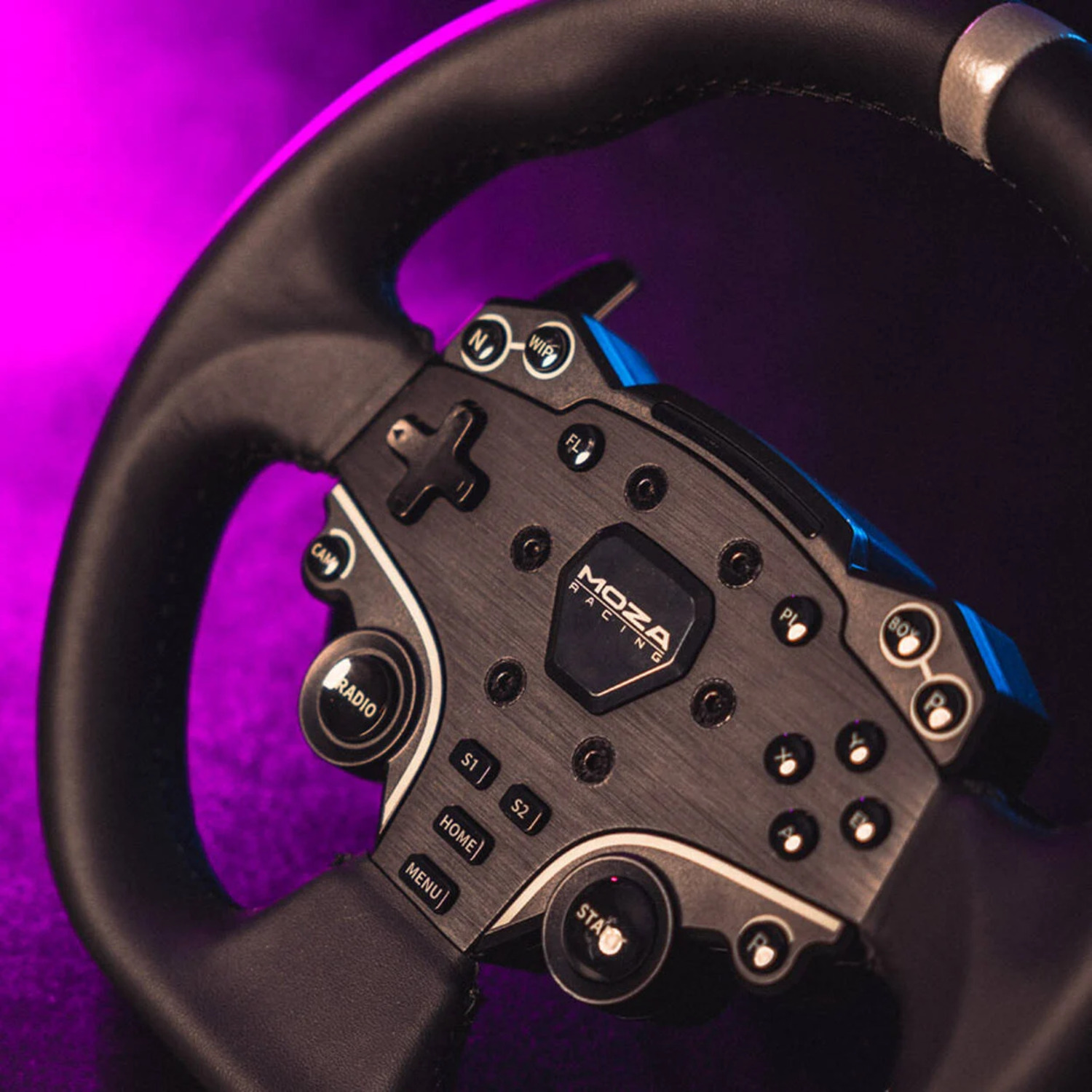 A close-up of a black and gray racing wheel with buttons and the 'MOZA Racing' logo against a purple background.
