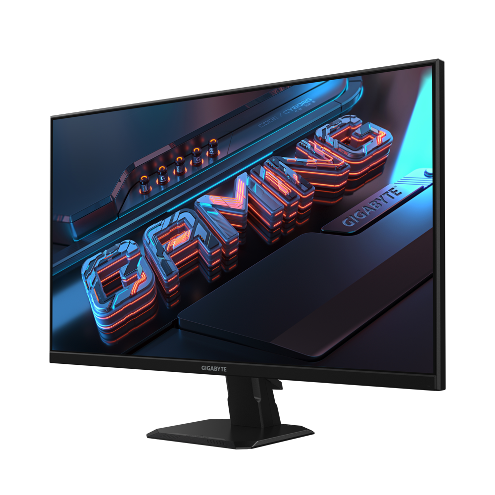 Un monitor de computadora muestra la palabra 'GAMING'. La pantalla tiene un tema oscuro con acentos naranjas y azules. La marca es 'GIGABYTE'.
