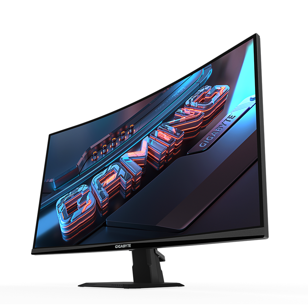 Un monitor curvo para juegos GIGABYTE. La pantalla muestra la palabra 'GAME' en naranja y azul neón. El monitor es negro.
