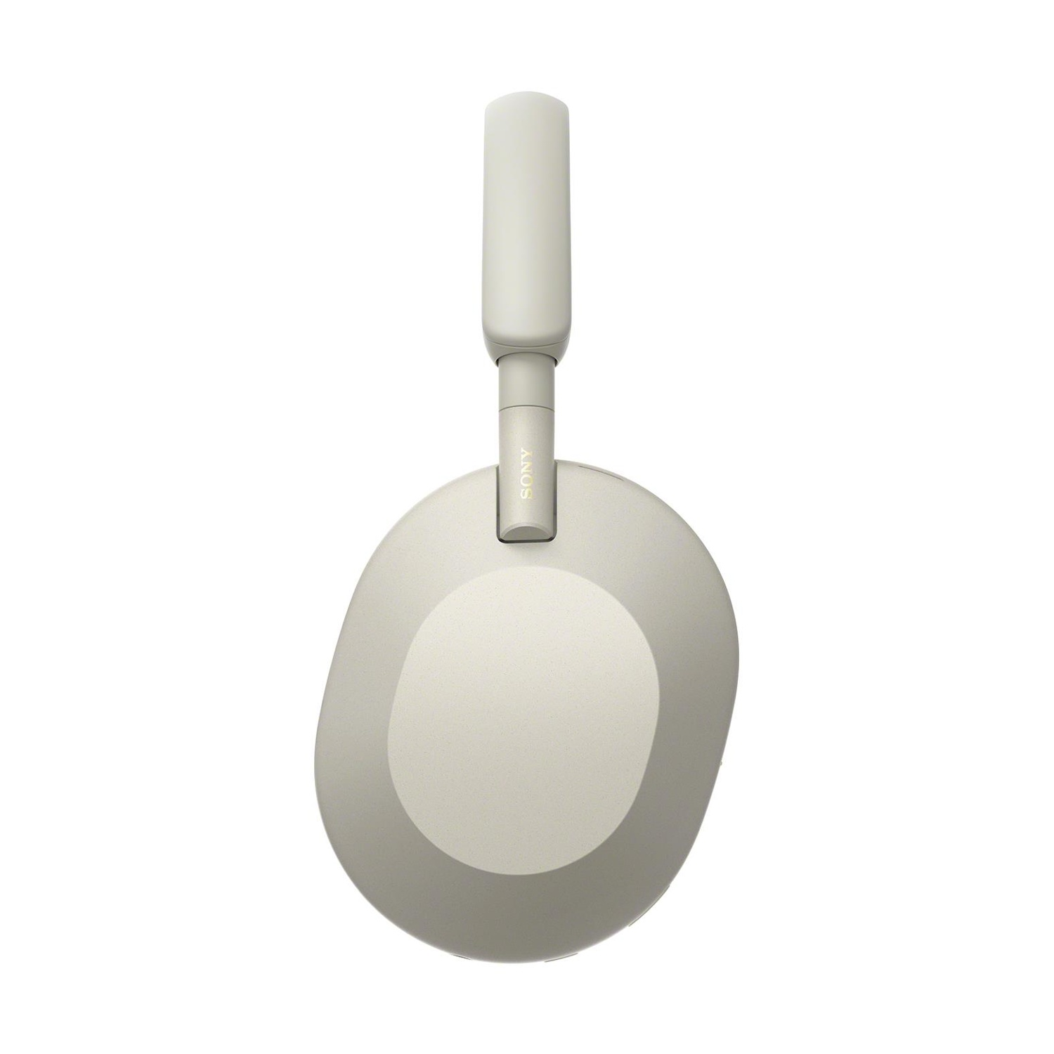 Cuffie Sony beige chiaro. Le cuffie hanno una fascia per la testa e padiglioni auricolari ovali. Il logo Sony è visibile.