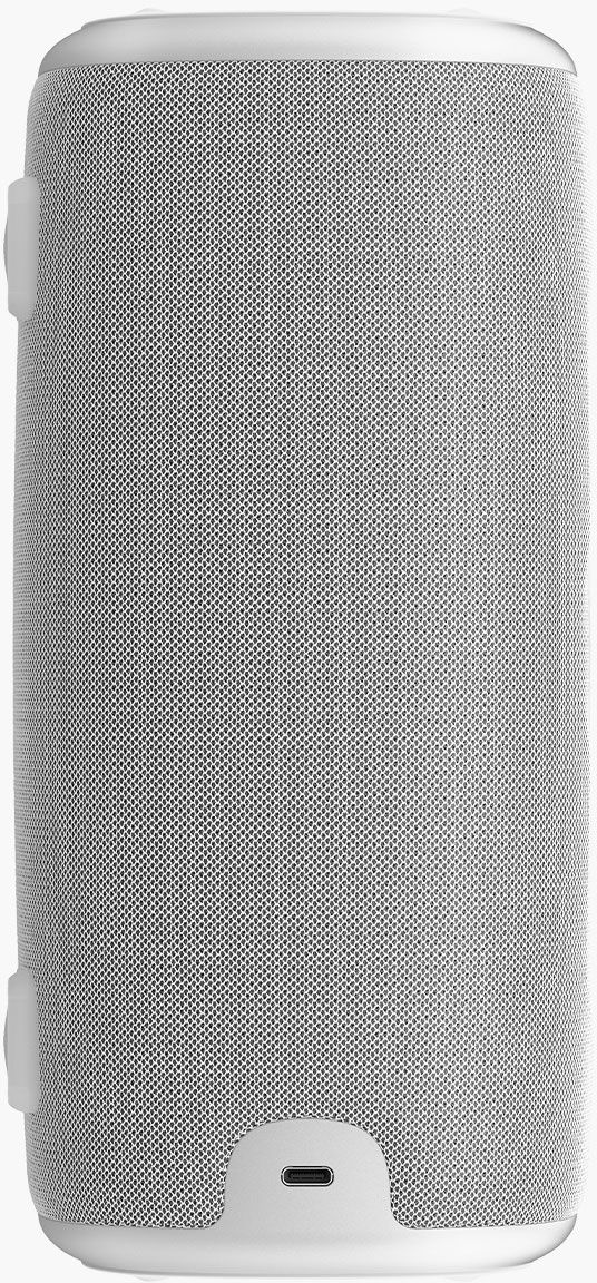 Un haut-parleur cylindrique blanc avec une surface en maille. Il dispose d'un port de charge et de deux accents latéraux blancs.
