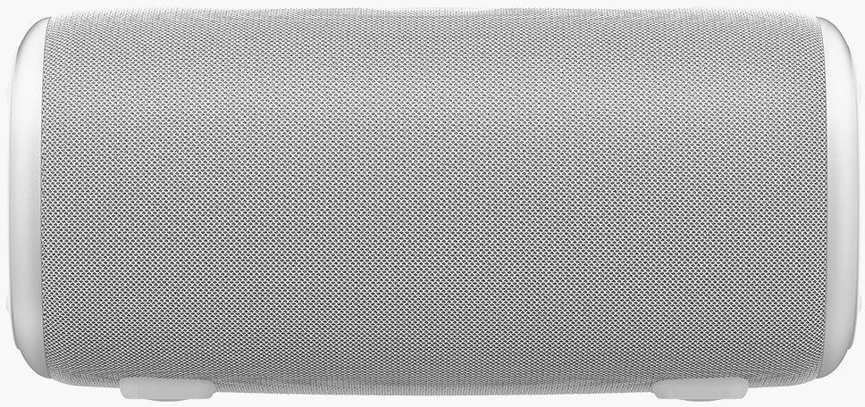 Un haut-parleur cylindrique blanc. L'avant est en mesh. Embouts blancs et petits pieds. Le haut-parleur est sur fond blanc.
