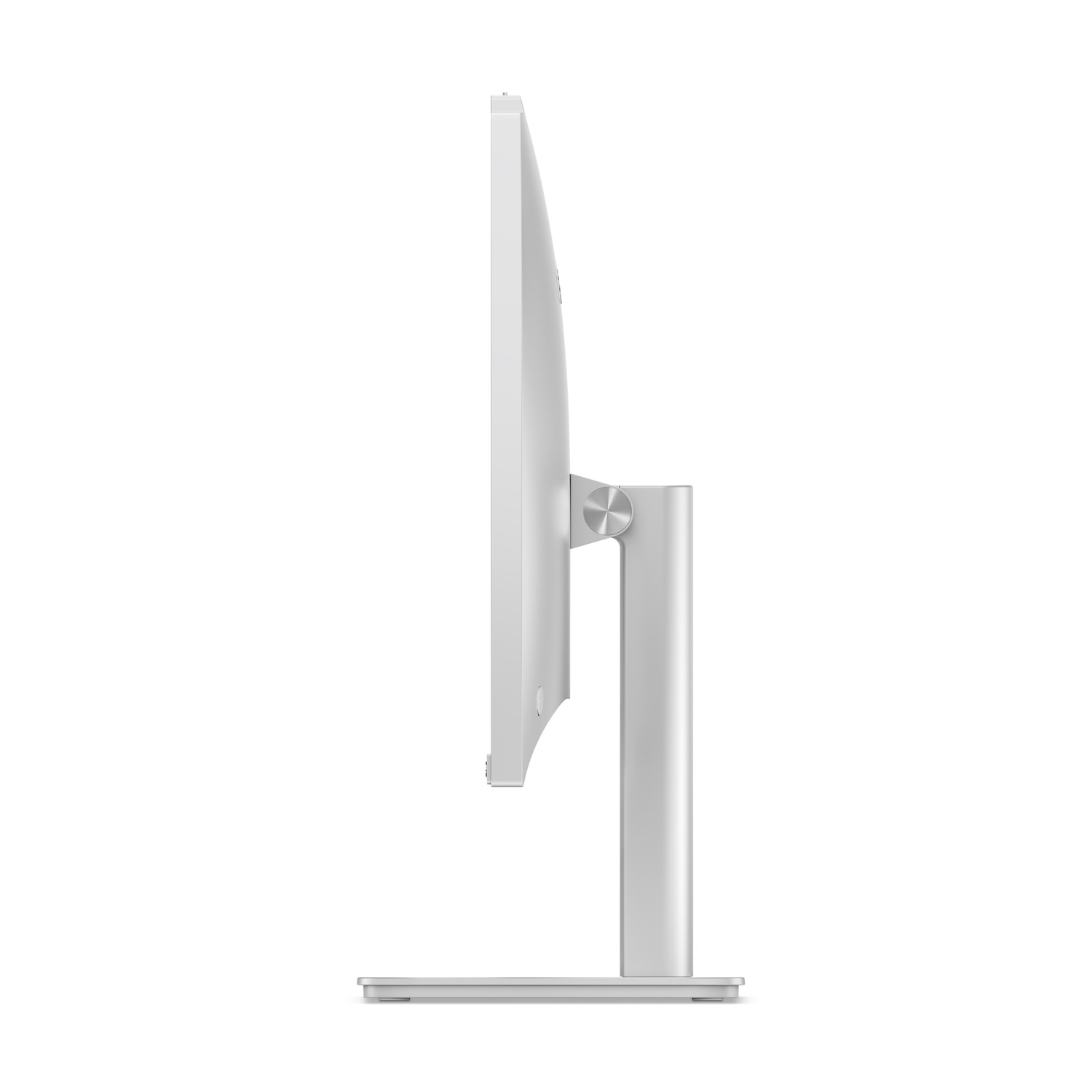 Vue latérale d'un écran d'ordinateur argenté. L'écran est sur un support, avec un design simple. Le fond est blanc.
