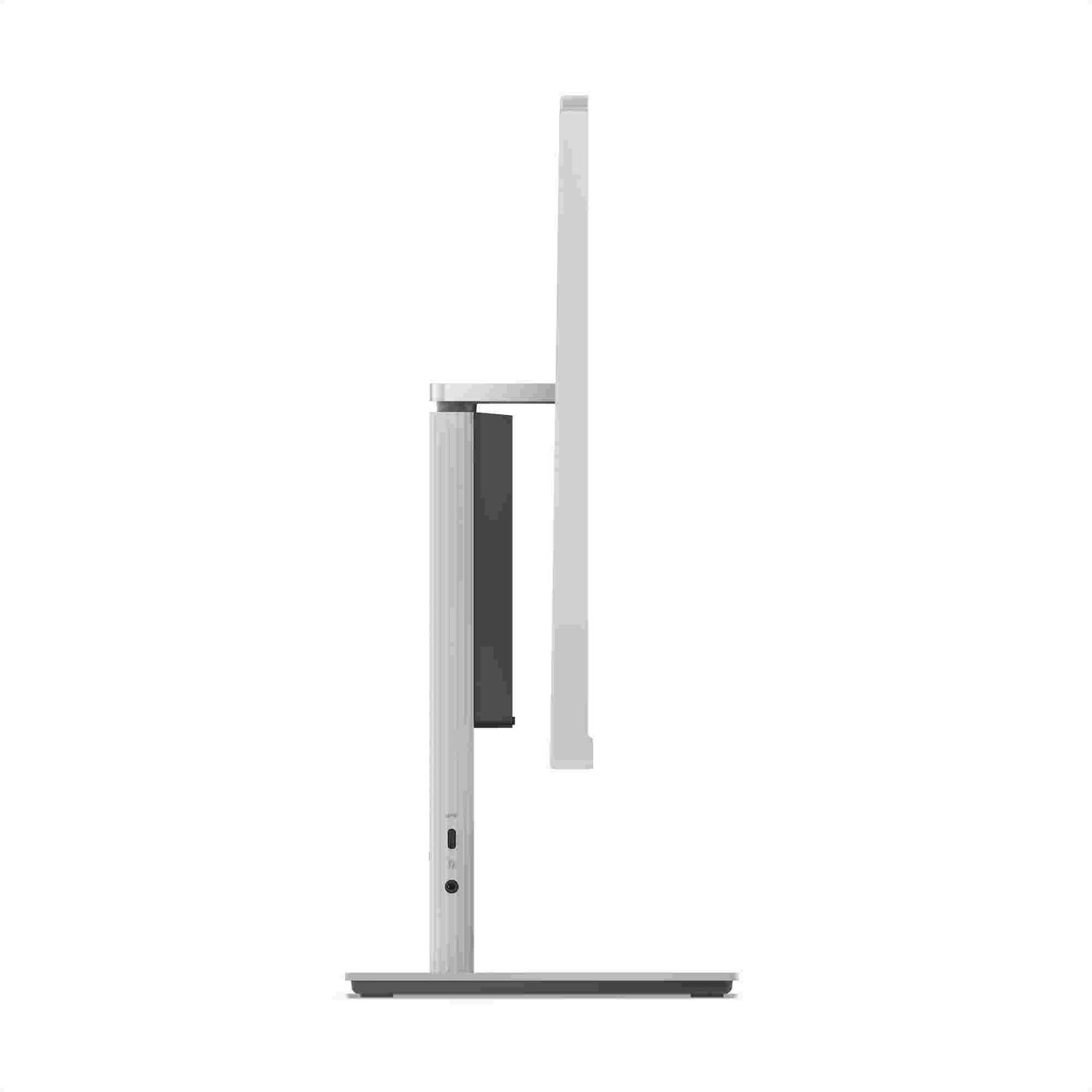 Vue latérale d'un moniteur. Il a un écran blanc, un support gris et un bloc noir rectangulaire à l'arrière.