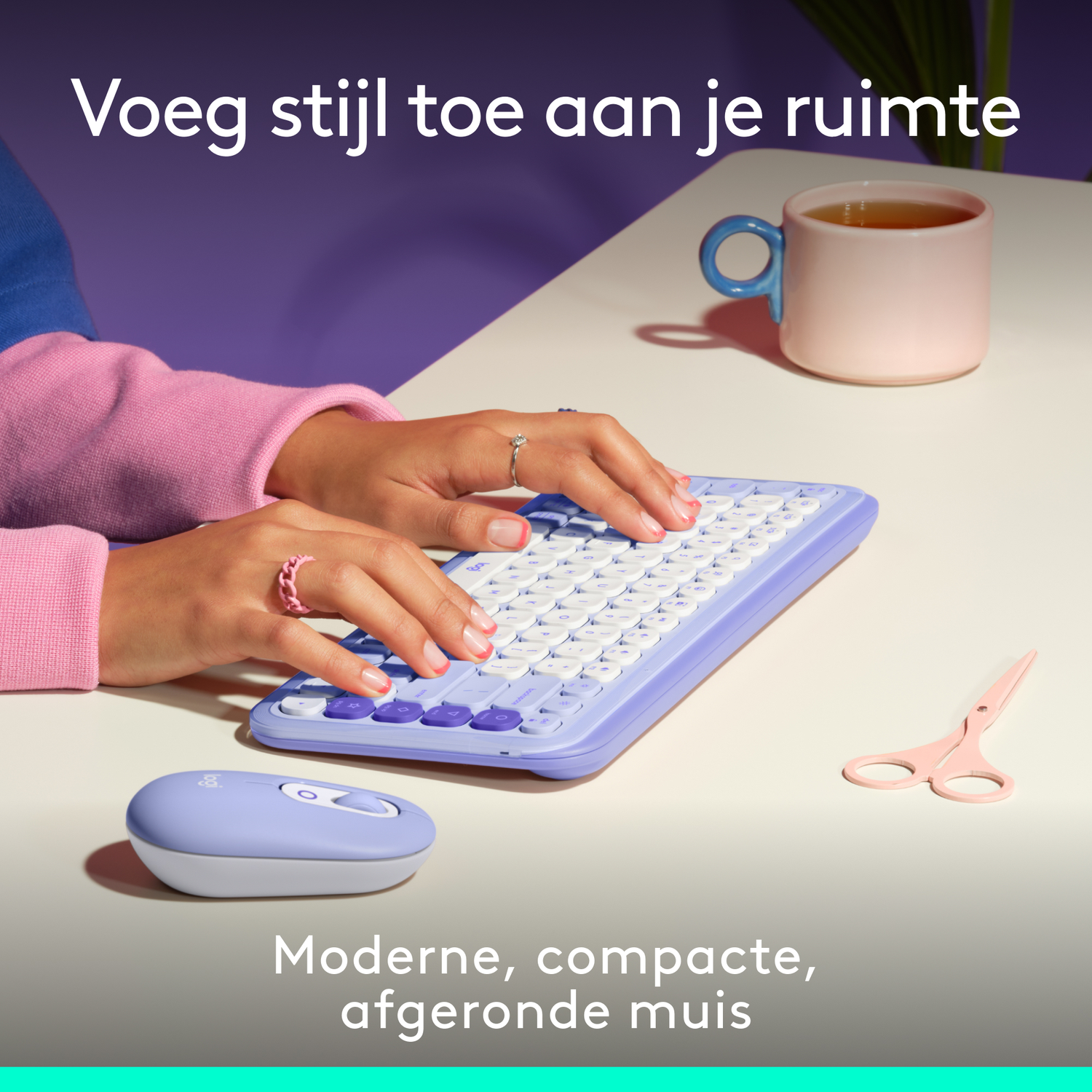 A person typing on a lavender keyboard. A mouse, scissors, and a teacup are on the white surface. Text: Modern, compact, rounded mouse.