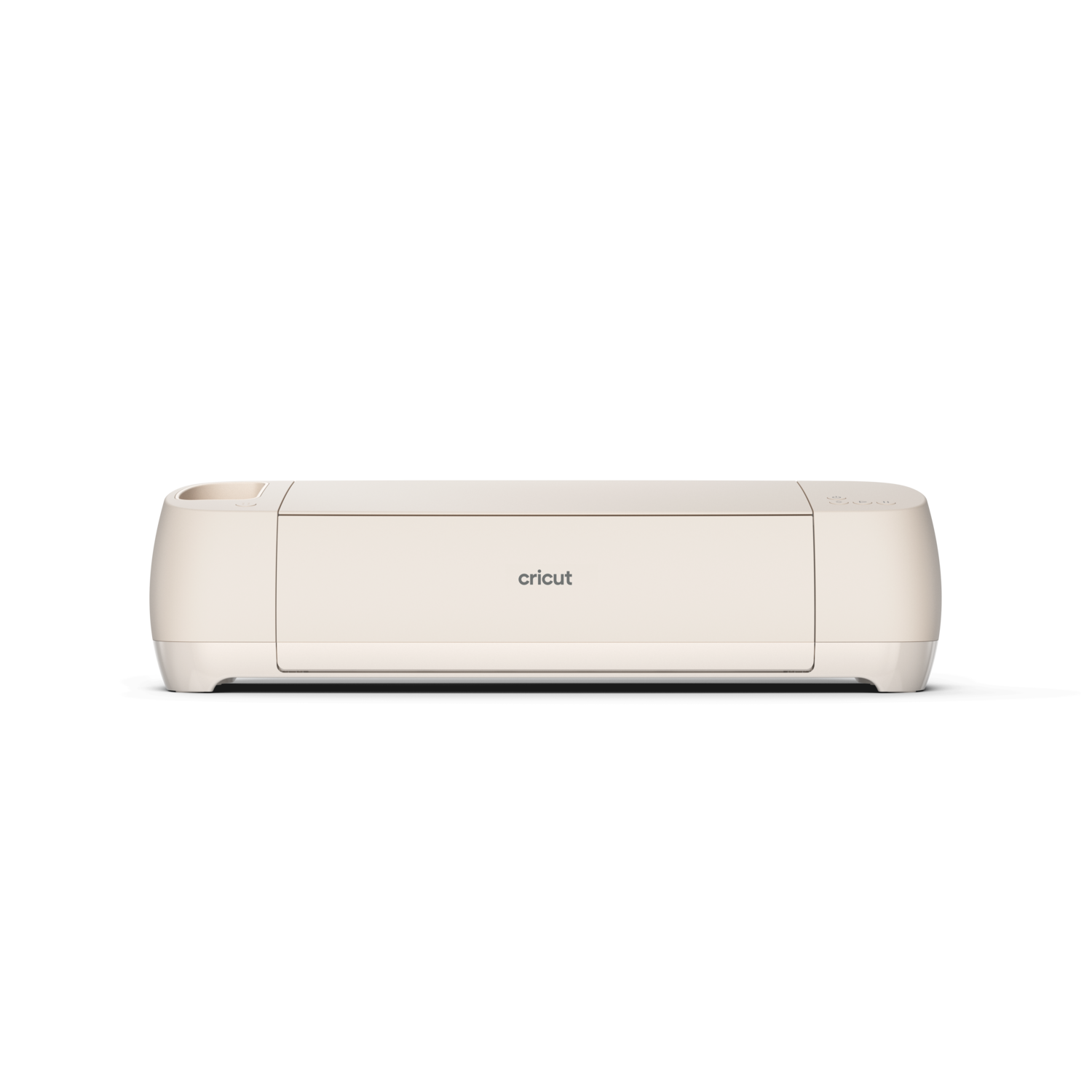 A cream-colored Cricut machine is centered on a black background. The machine is rectangular with rounded corners.
