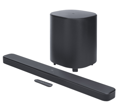 Czarny soundbar, subwoofer i pilot na białym tle. Subwoofer jest cylindryczny.