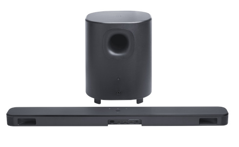Czarny soundbar i subwoofer na białym tle. Subwoofer jest cylindryczny, a soundbar prostokątny.