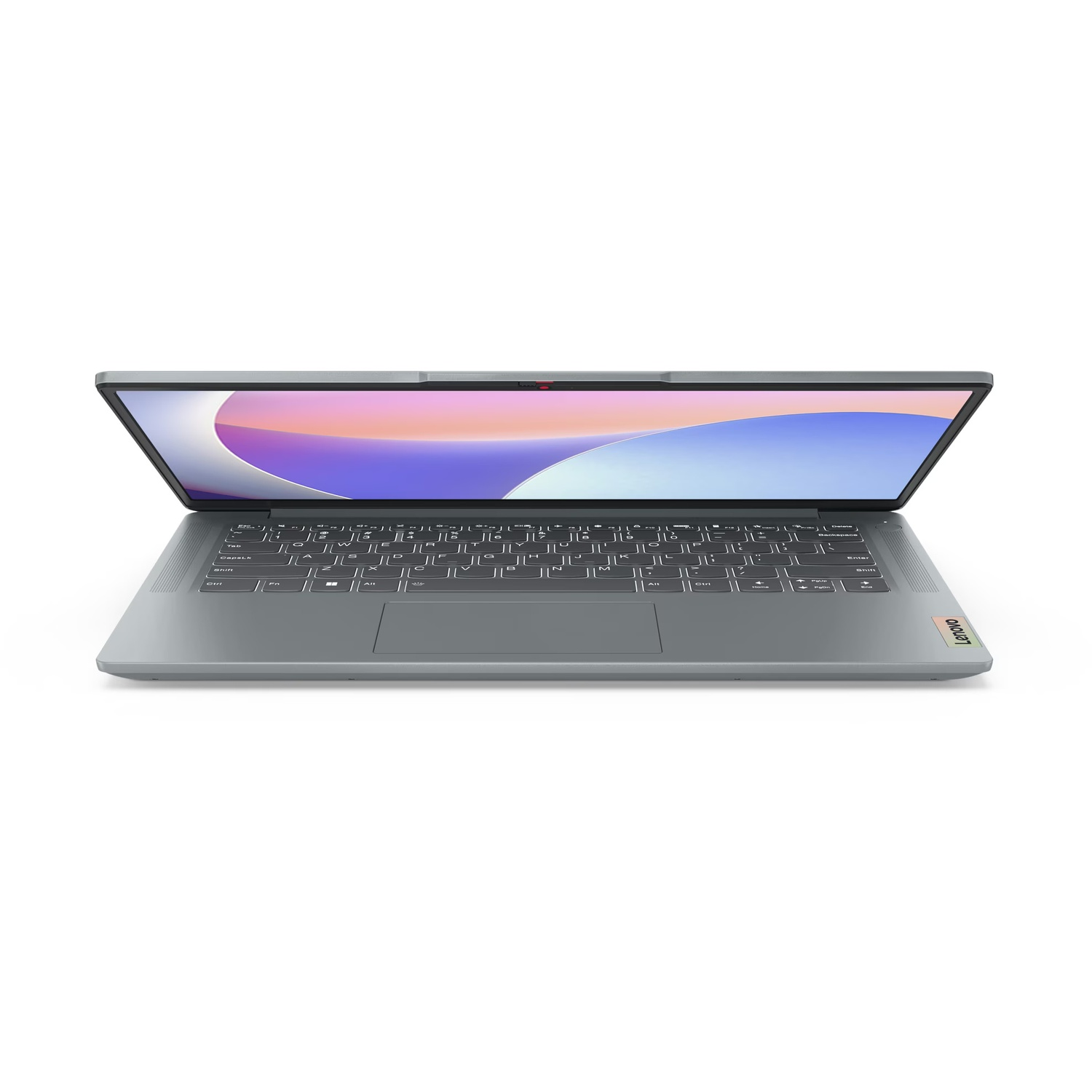 A gray Lenovo laptop is open, displaying a colorful screen. The keyboard is visible with white keys and the Lenovo logo is on the side.