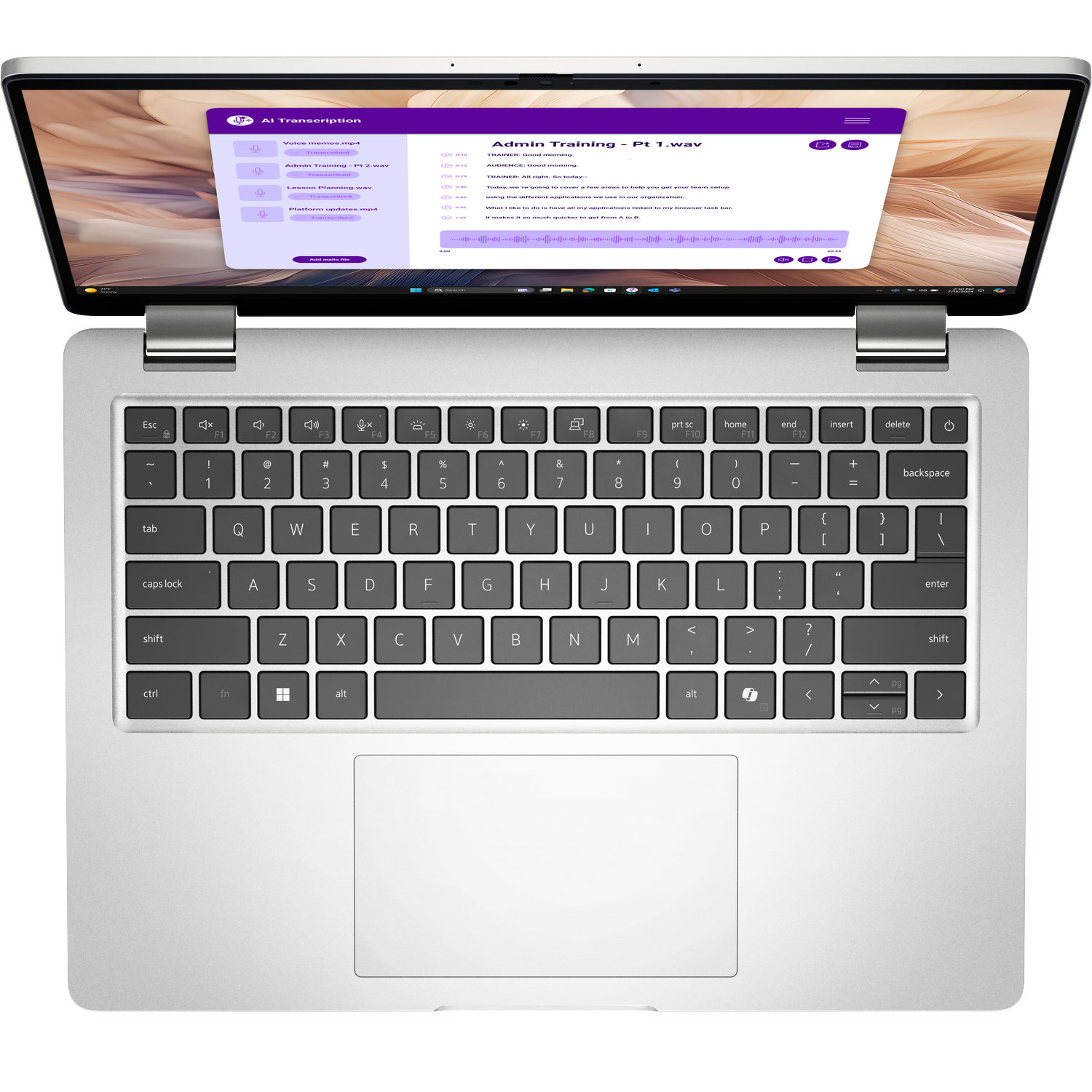 Een laptop met een open scherm waarop transcriptiesoftware wordt weergegeven.
