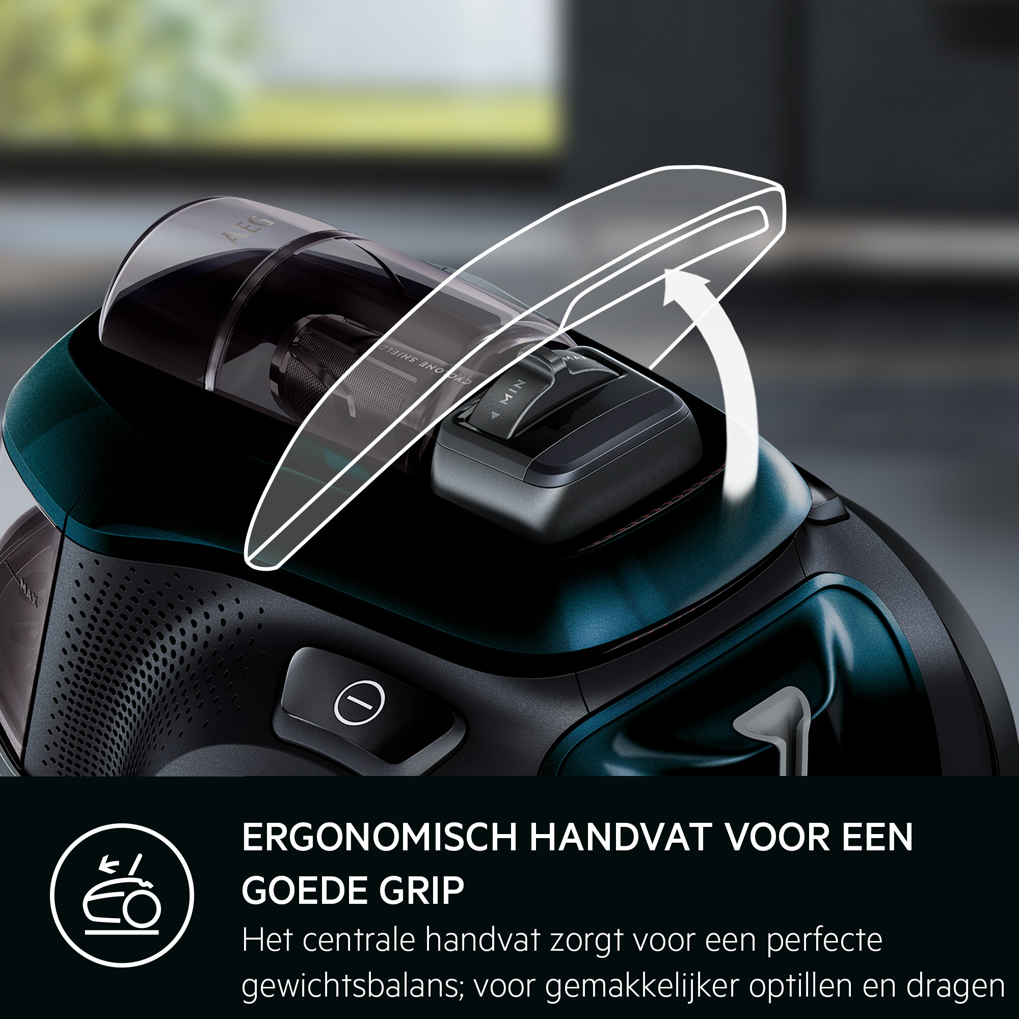 Gros plan d'un aspirateur avec une poignée. Un schéma montre la poignée et la flèche, soulignant son design ergonomique.