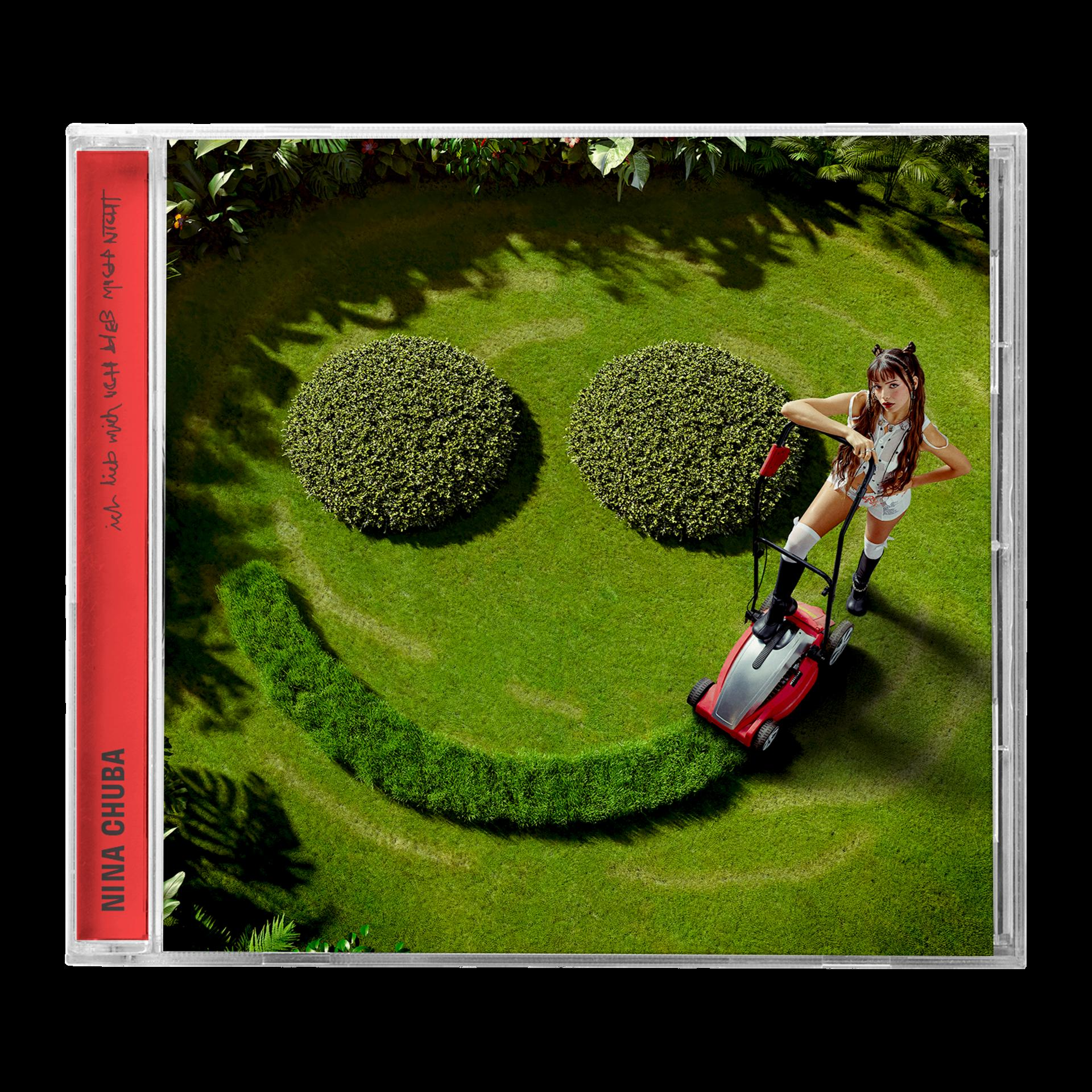 Eine Frau mäht einen Rasen in Form eines Smileys. Das Albumcover befindet sich auf einem roten Cover mit rotem Titel.