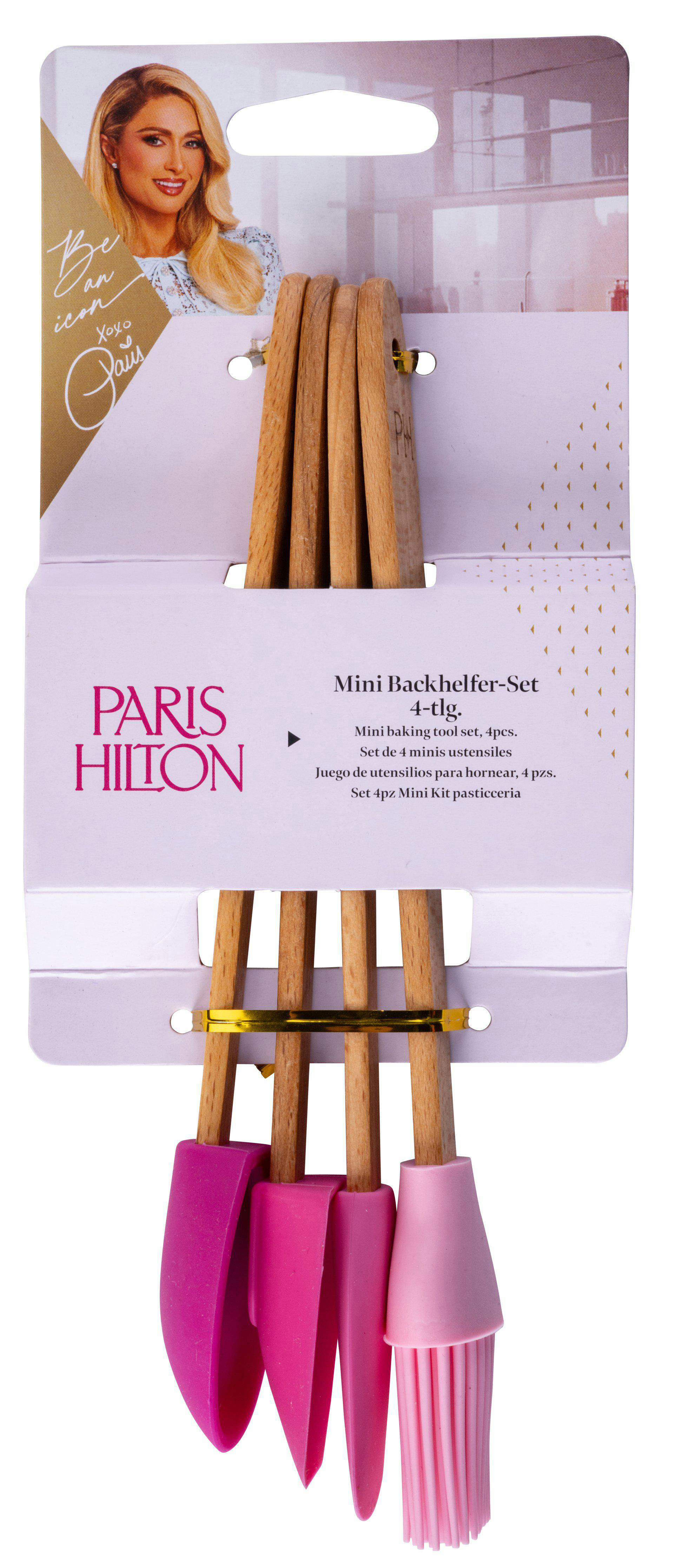 Ein Mini-Backwerkzeug-Set der Marke Paris Hilton. Das Set enthält Werkzeuge mit Holzgriffen und rosa und fuchsiafarbenen Silikonköpfen.
