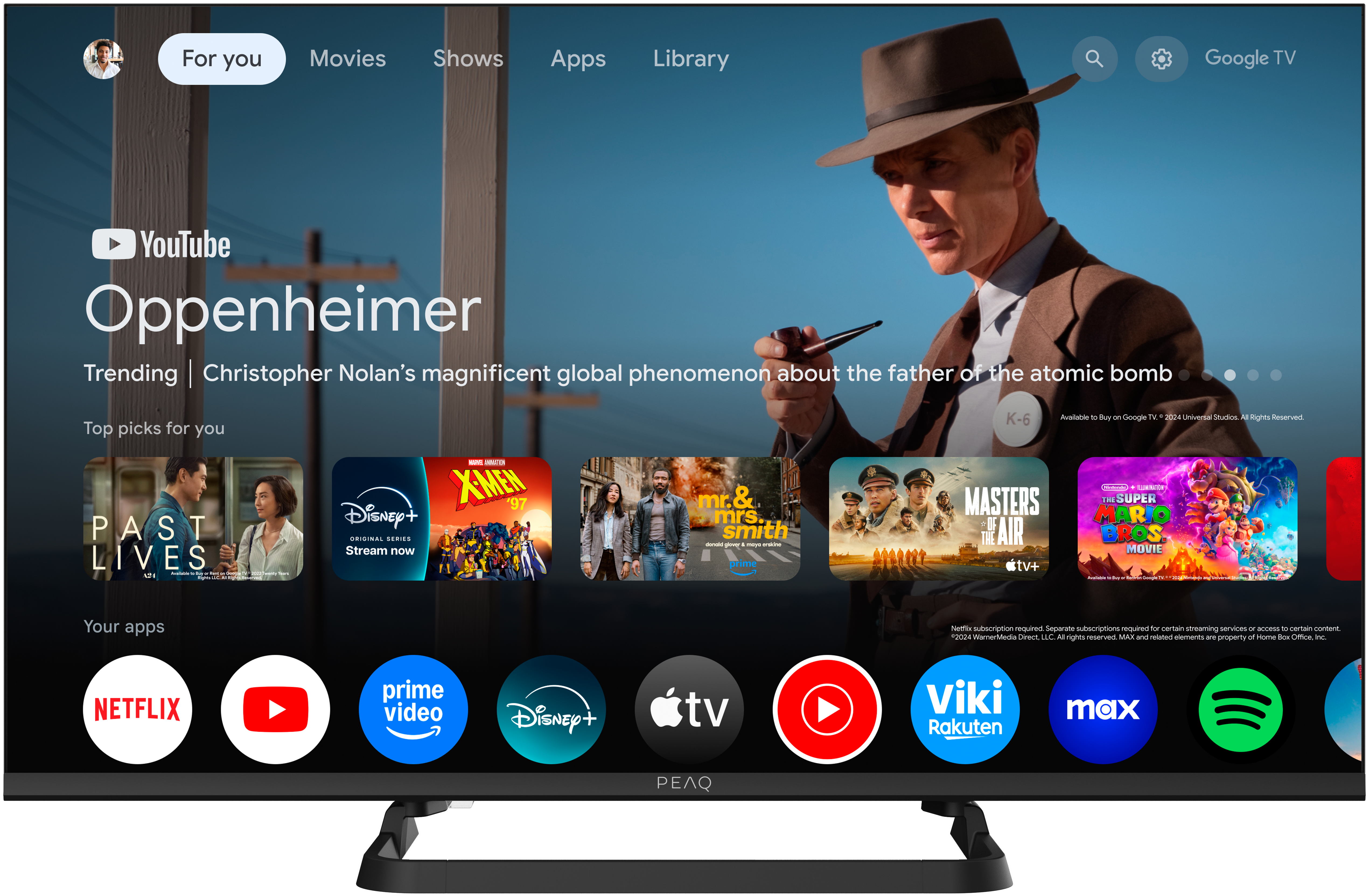 Ein Fernsehbildschirm zeigt 'Oppenheimer' auf YouTube. Symbole für Apps wie Netflix, YouTube, Prime Video und Disney+ sind sichtbar.