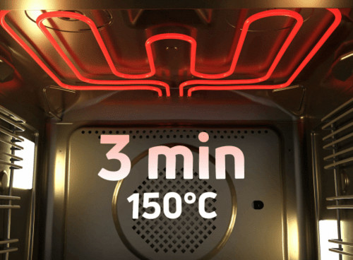 Wewnątrz piekarnika świecą się czerwone elementy grzejne. Tekst brzmi: '3 min 150°C'. Wnętrze piekarnika jest metalowe.