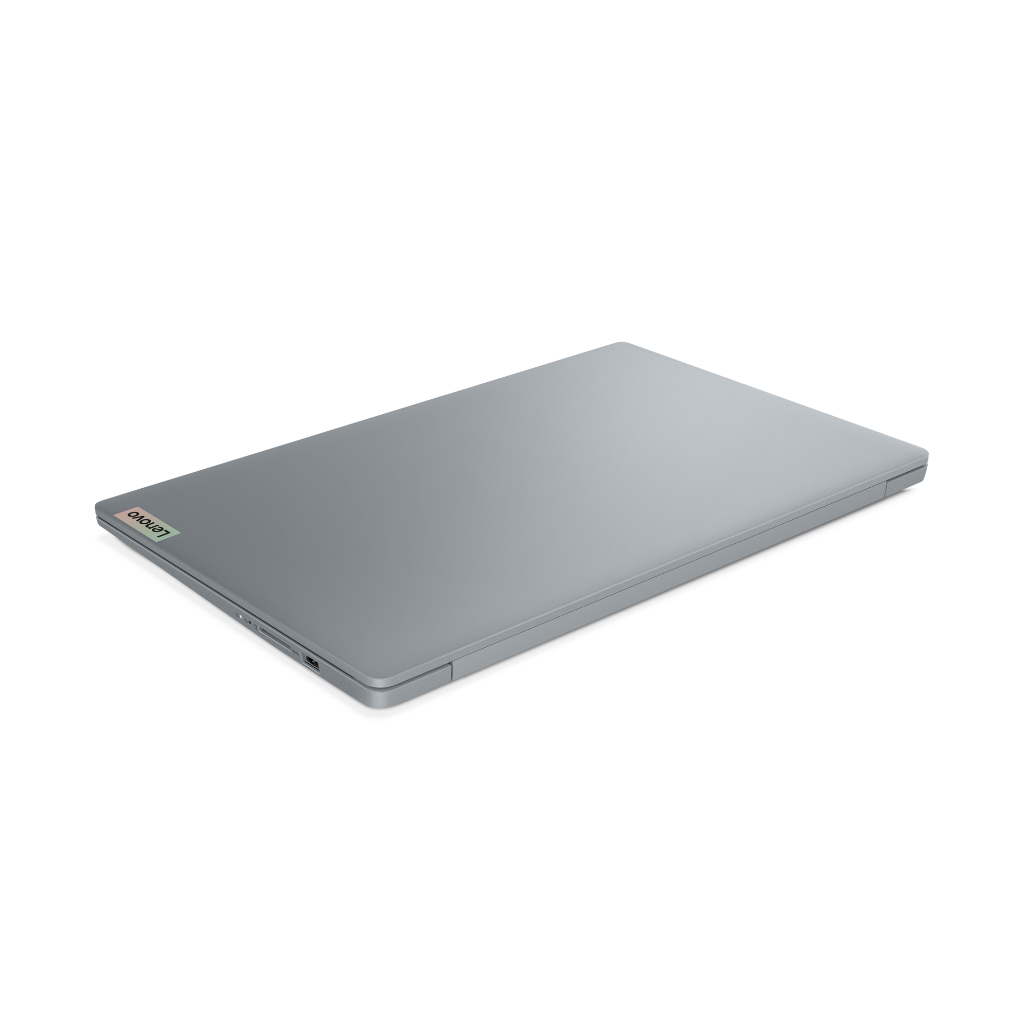 Een gesloten, zilveren Lenovo-laptop op een zwarte achtergrond. Het Lenovo-logo is zichtbaar.