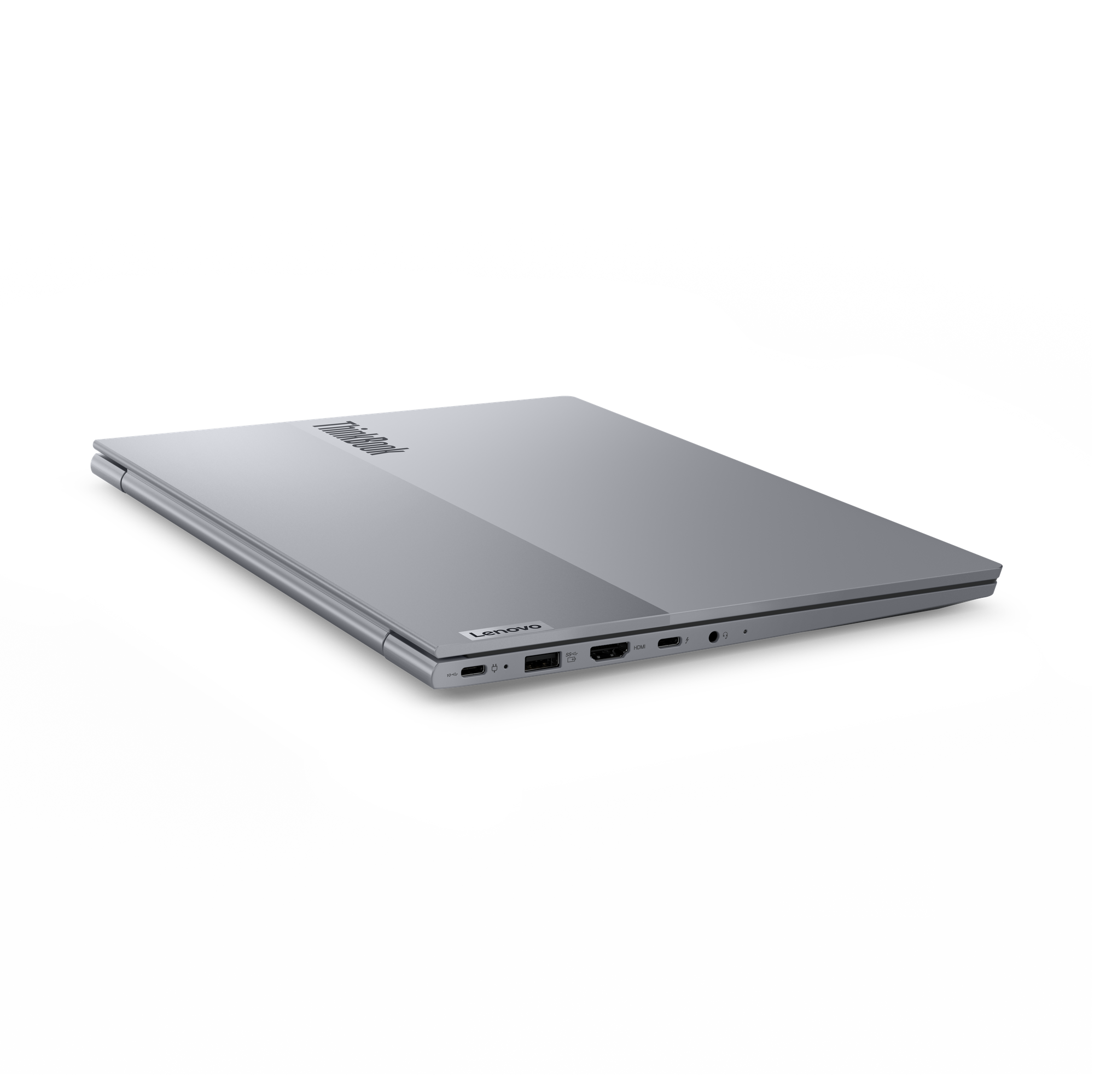 Srebrny laptop Lenovo ThinkBook na czarnym tle. Laptop jest częściowo otwarty, pokazując porty.