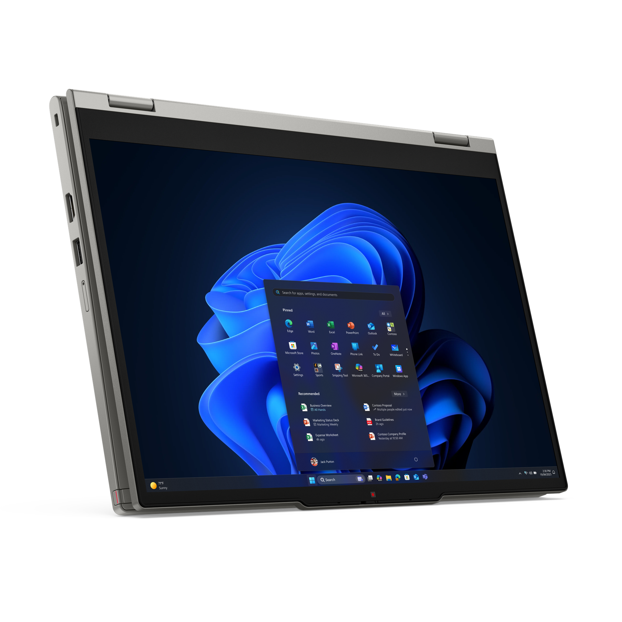 Silberner Laptop zeigt Windows 11 mit App-Symbolen und Suchleiste, mit blauem, abstraktem Hintergrund. Schwarzer Hintergrund.
