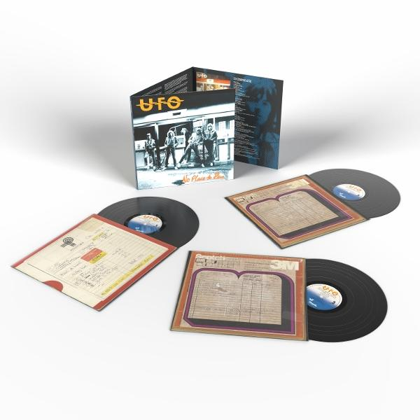 UFO-Albumcover und Schallplatten. Das Albumcover zeigt Bandmitglieder. Schallplatten sind schwarz mit Etiketten und Hüllen.